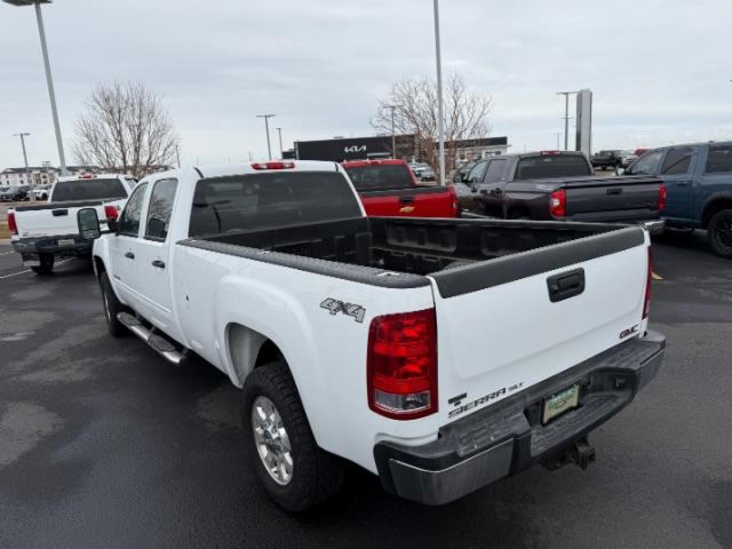 2013 Summit White /Ebony Cloth Interior GMC Sierra 3500HD SLE Crew Cab Long Box 4WD (1GT423C80DF) with an 6.6L V8 32V OHV DIESEL engine, 6-Speed Automatic transmission, located at 1235 N Woodruff Ave., Idaho Falls, 83401, (208) 523-1053, 43.507172, -112.000488 - At Timberline Auto, finding a great deal on your next vehicle is always easy! Our experienced sales staff's goal is to help find you the right vehicle at the right price! Our knowledgeable finance department has options for almost any credit score. We offer extended service contract options to prote - Photo#2