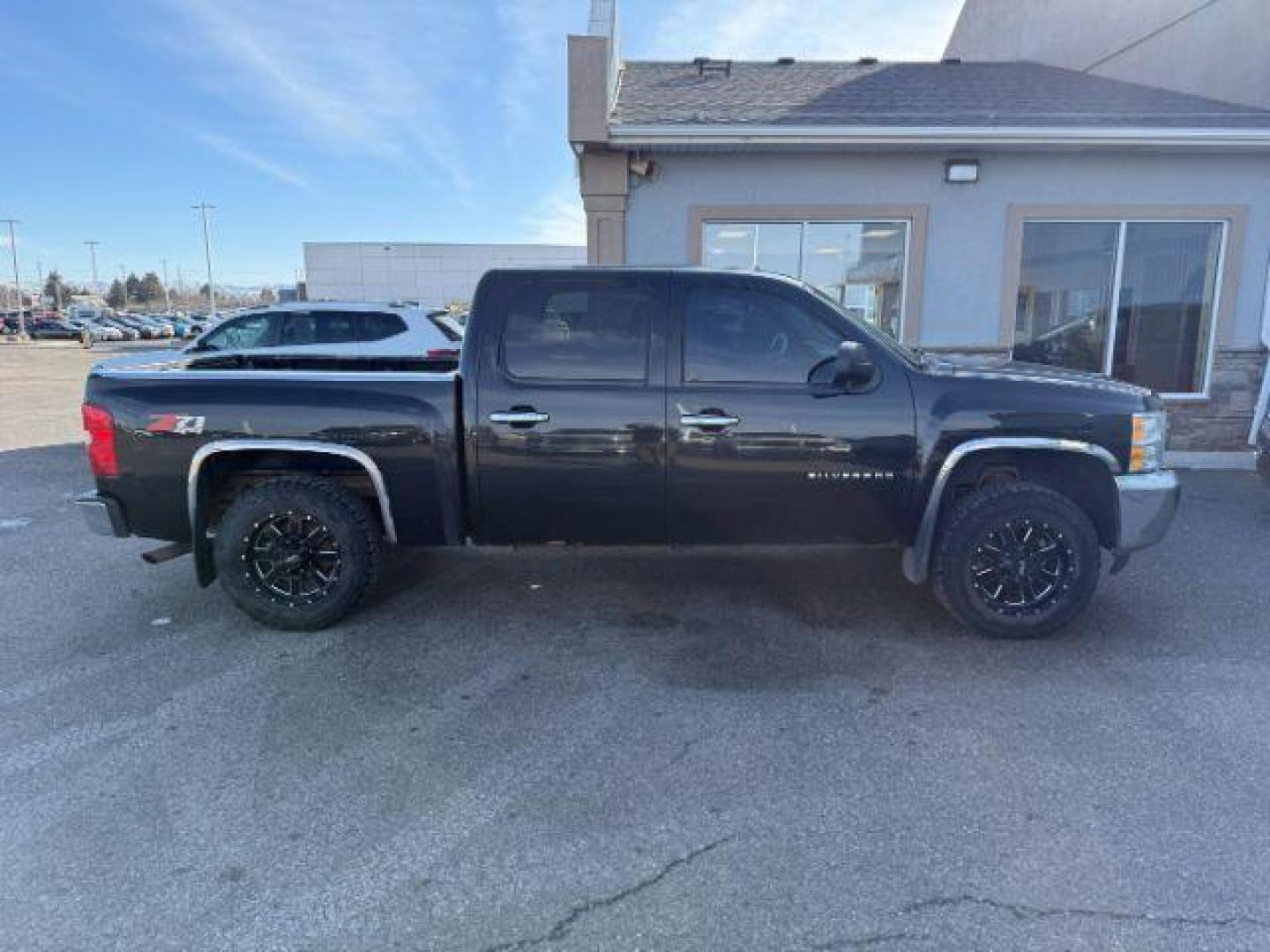 2013 Black /Ebony Cloth Interior Chevrolet Silverado 1500 (3GCPKSE74DG) with an 53L V8 OHV 16V FFV engine, Automatic transmission, located at 1175 N Woodruff Ave, Idaho Falls, ID, 83401, 43.506901, -111.999657 - At Timberline Auto, finding a great deal on your next vehicle is always easy! Our experienced sales staff's goal is to help find you the right vehicle at the right price! Our knowledgeable finance department has options for almost any credit score. We offer extended service contract options to prote - Photo#27