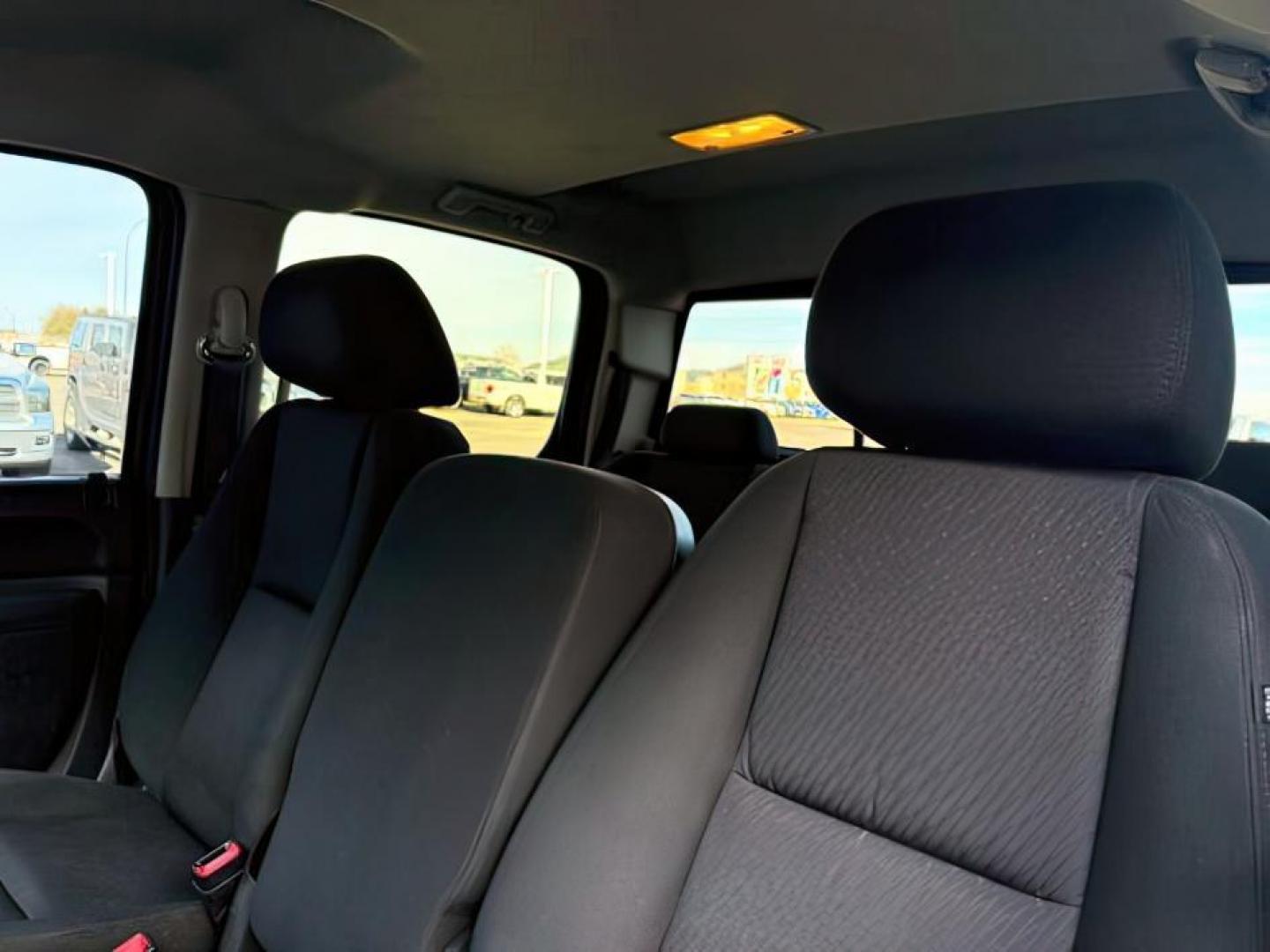 2013 Black /Ebony Cloth Interior Chevrolet Silverado 1500 (3GCPKSE74DG) with an 53L V8 OHV 16V FFV engine, Automatic transmission, located at 1175 N Woodruff Ave, Idaho Falls, ID, 83401, 43.506901, -111.999657 - At Timberline Auto, finding a great deal on your next vehicle is always easy! Our experienced sales staff's goal is to help find you the right vehicle at the right price! Our knowledgeable finance department has options for almost any credit score. We offer extended service contract options to prote - Photo#16