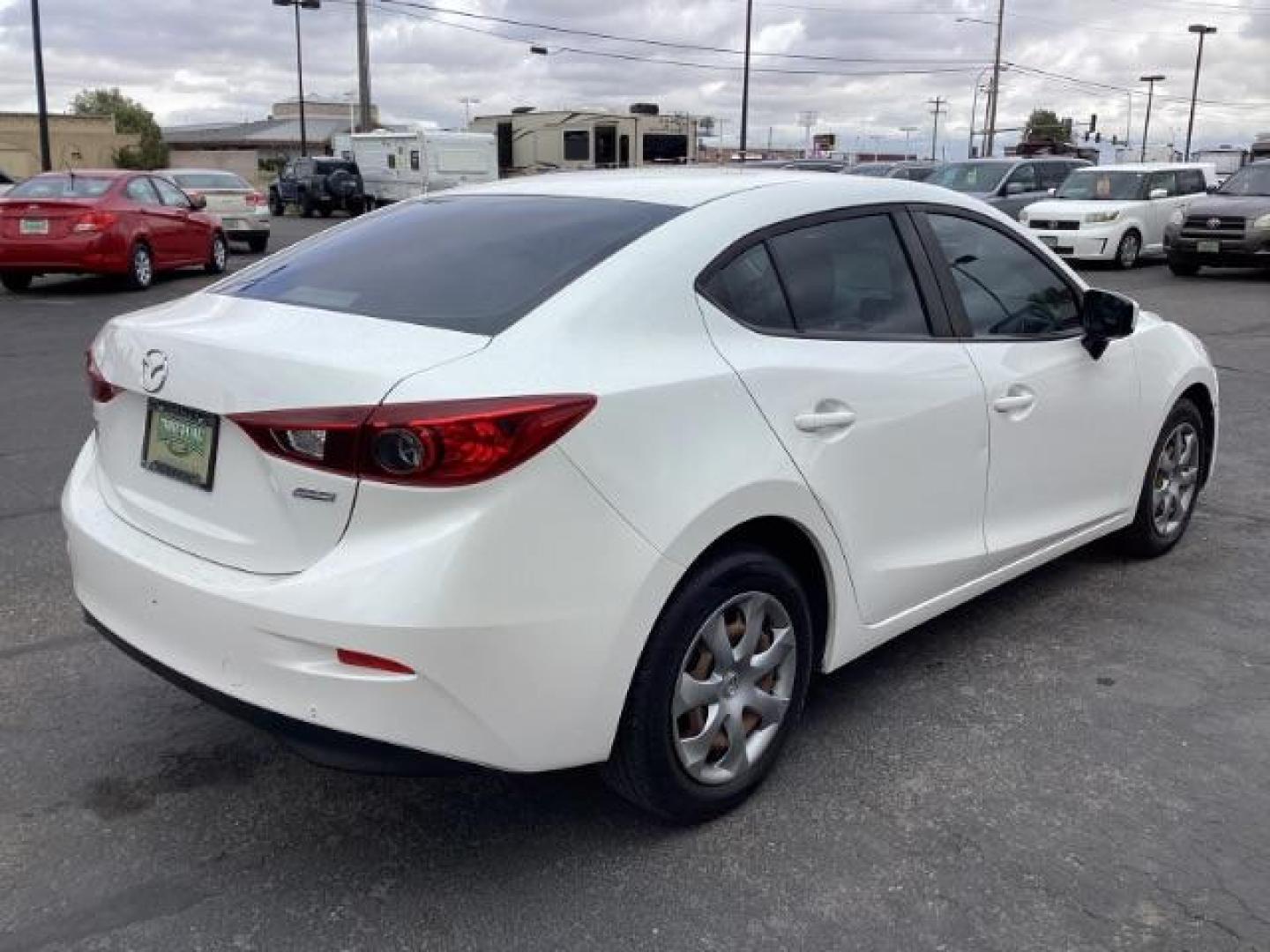 2014 WHITE /Black Mazda MAZDA3 i Sport AT 4-Door (JM1BM1U74E1) with an 2.0L L4 DOHC 16V engine, 6-Speed Automatic transmission, located at 1235 N Woodruff Ave., Idaho Falls, 83401, (208) 523-1053, 43.507172, -112.000488 - Photo#4