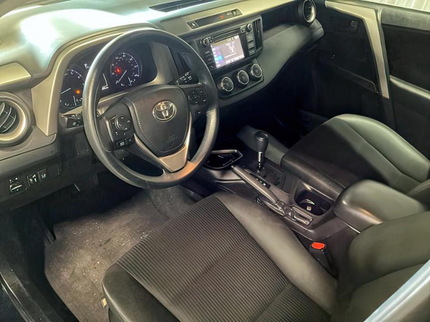 2018 Galactic Aqua Mica /Black, cloth Toyota RAV4 (2T3ZFREV9JW) with an 25L L4 DOHC 16V engine, Automatic transmission, located at 1175 N Woodruff Ave, Idaho Falls, ID, 83401, 43.506901, -111.999657 - At Timberline Auto, finding a great deal on your next vehicle is always easy! Our experienced sales staff's goal is to help find you the right vehicle at the right price! Our knowledgeable finance department has options for almost any credit score. We offer extended service contract options to prote - Photo#8