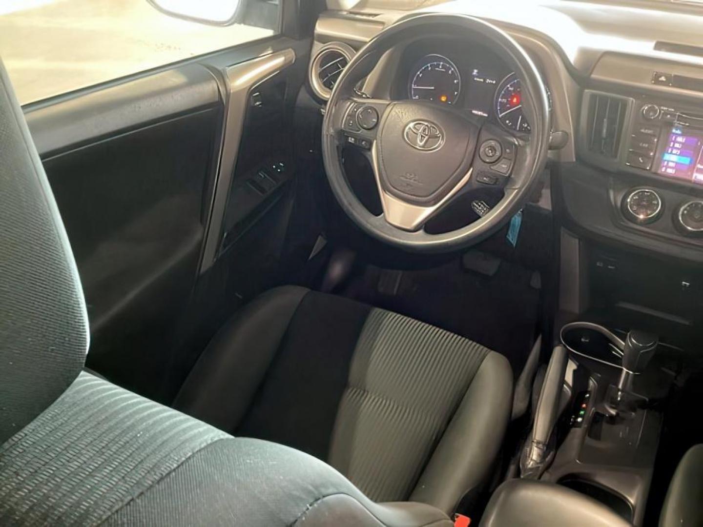 2018 Galactic Aqua Mica /Black, cloth Toyota RAV4 (2T3ZFREV9JW) with an 25L L4 DOHC 16V engine, Automatic transmission, located at 1175 N Woodruff Ave, Idaho Falls, ID, 83401, 43.506901, -111.999657 - At Timberline Auto, finding a great deal on your next vehicle is always easy! Our experienced sales staff's goal is to help find you the right vehicle at the right price! Our knowledgeable finance department has options for almost any credit score. We offer extended service contract options to prote - Photo#14