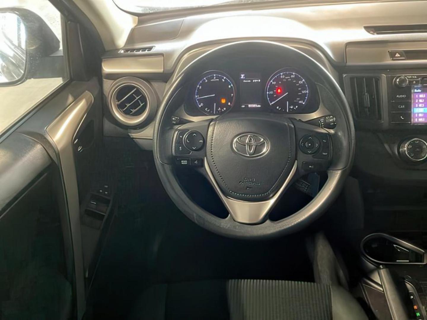 2018 Galactic Aqua Mica /Black, cloth Toyota RAV4 (2T3ZFREV9JW) with an 25L L4 DOHC 16V engine, Automatic transmission, located at 1175 N Woodruff Ave, Idaho Falls, ID, 83401, 43.506901, -111.999657 - At Timberline Auto, finding a great deal on your next vehicle is always easy! Our experienced sales staff's goal is to help find you the right vehicle at the right price! Our knowledgeable finance department has options for almost any credit score. We offer extended service contract options to prote - Photo#17