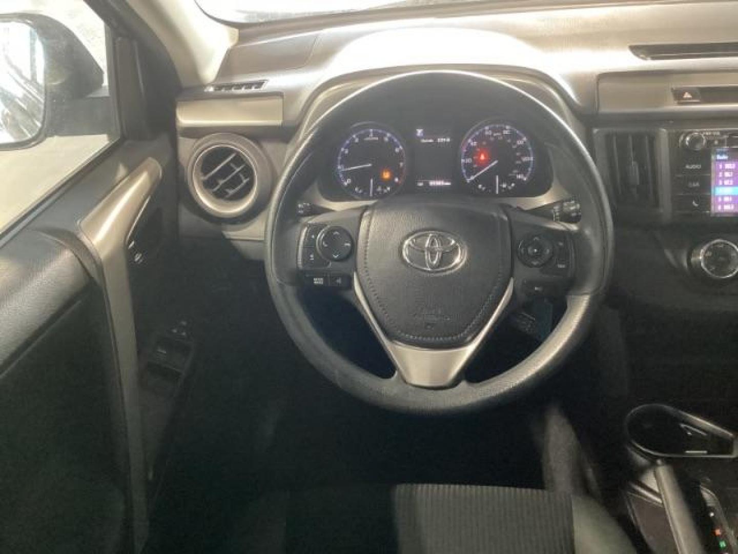2018 Galactic Aqua Mica /Black, cloth Toyota RAV4 LE FWD (2T3ZFREV9JW) with an 2.5L L4 DOHC 16V engine, 6-Speed Automatic transmission, located at 1235 N Woodruff Ave., Idaho Falls, 83401, (208) 523-1053, 43.507172, -112.000488 - At Timberline Auto, finding a great deal on your next vehicle is always easy! Our experienced sales staff's goal is to help find you the right vehicle at the right price! Our knowledgeable finance department has options for almost any credit score. We offer extended service contract options to prote - Photo#16