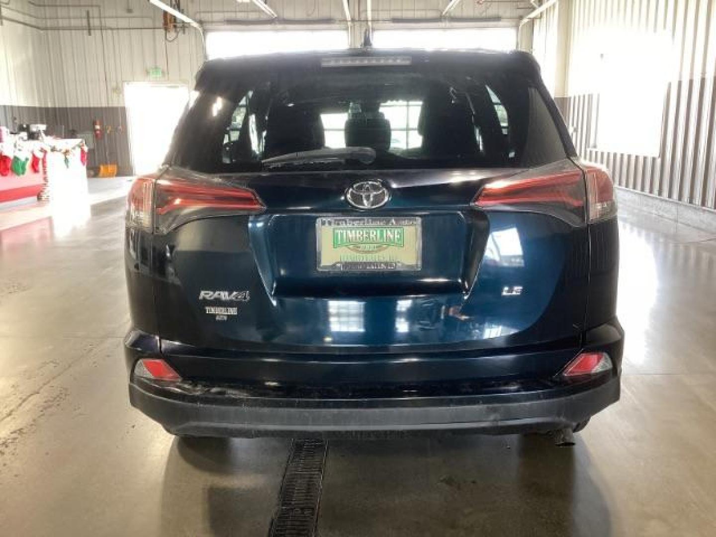 2018 Galactic Aqua Mica /Black, cloth Toyota RAV4 LE FWD (2T3ZFREV9JW) with an 2.5L L4 DOHC 16V engine, 6-Speed Automatic transmission, located at 1235 N Woodruff Ave., Idaho Falls, 83401, (208) 523-1053, 43.507172, -112.000488 - At Timberline Auto, finding a great deal on your next vehicle is always easy! Our experienced sales staff's goal is to help find you the right vehicle at the right price! Our knowledgeable finance department has options for almost any credit score. We offer extended service contract options to prote - Photo#2