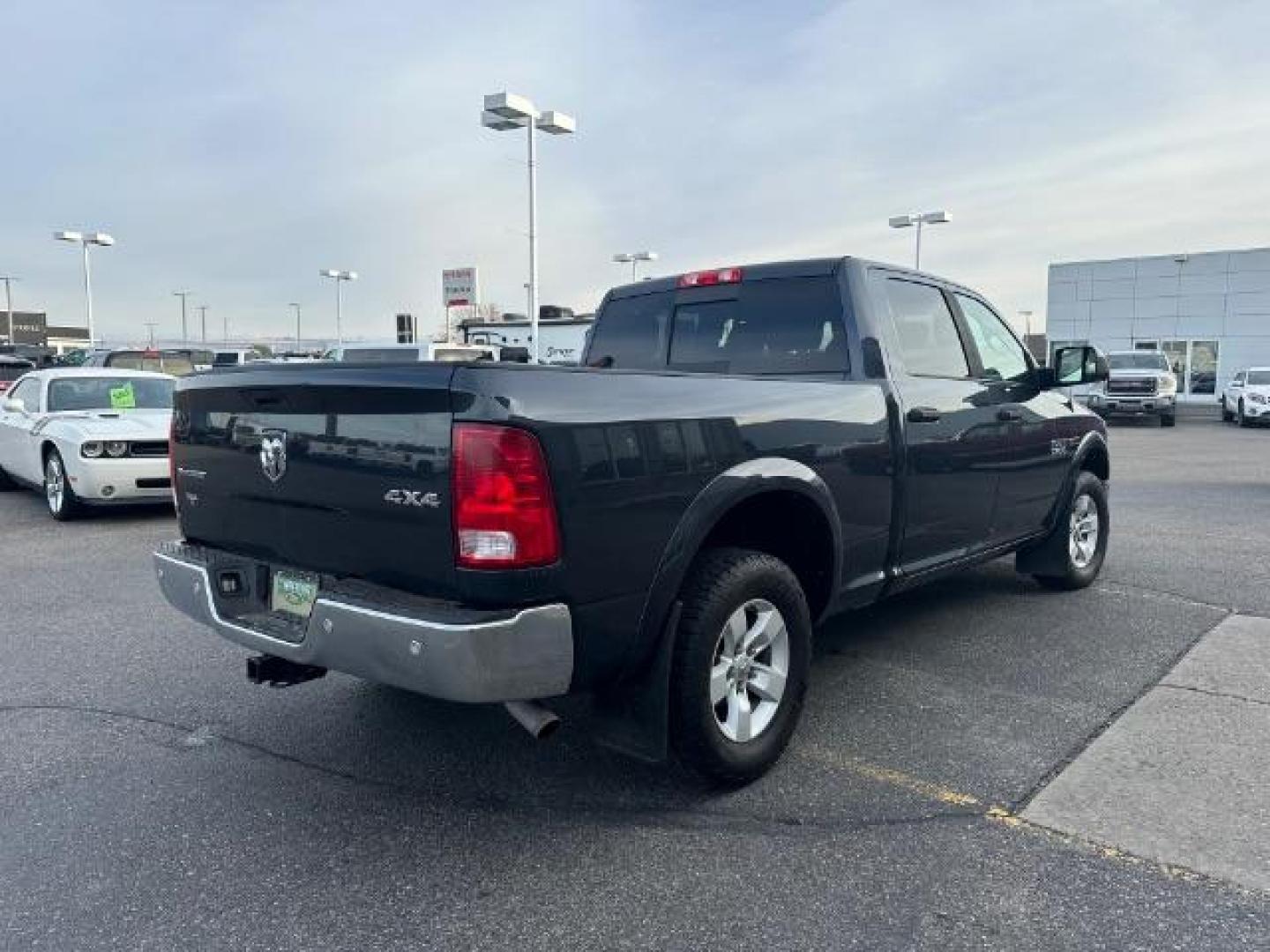 2016 GRAY /Black/Diesel Gray, cloth RAM 1500 SLT Crew Cab LWB 4WD (1C6RR7TM9GS) with an 3.0L V6 DOHC 24V DIESEL engine, 8-Speed Automatic transmission, located at 1235 N Woodruff Ave., Idaho Falls, 83401, (208) 523-1053, 43.507172, -112.000488 - Photo#5
