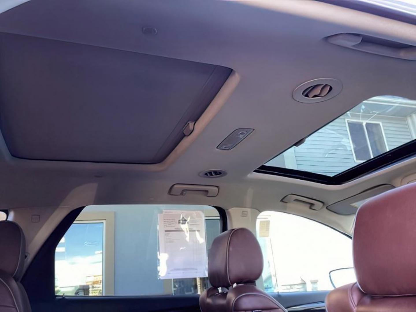 2021 White Frost Tricoat /Ebony Seats w/Ebony Interior Accents, leather Buick Enclave (5GAEVCKW7MJ) with an 36L V6 DOHC 24V engine, Automatic transmission, located at 1175 N Woodruff Ave, Idaho Falls, ID, 83401, 43.506901, -111.999657 - At Timberline Auto, finding a great deal on your next vehicle is always easy! Our experienced sales staff's goal is to help find you the right vehicle at the right price! Our knowledgeable finance department has options for almost any credit score. We offer extended service contract options to prote - Photo#31