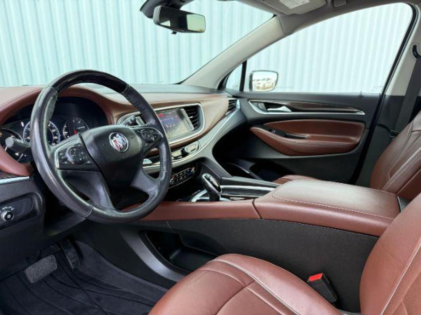 2021 White Frost Tricoat /Chestnut Seats w/Ebony Interior Accents, leather Buick Enclave Avenir AWD (5GAEVCKW7MJ) with an 3.6L V6 DOHC 24V engine, 9-Speed Automatic transmission, located at 1235 N Woodruff Ave., Idaho Falls, 83401, (208) 523-1053, 43.507172, -112.000488 - At Timberline Auto, finding a great deal on your next vehicle is always easy! Our experienced sales staff's goal is to help find you the right vehicle at the right price! Our knowledgeable finance department has options for almost any credit score. We offer extended service contract options to prote - Photo#48