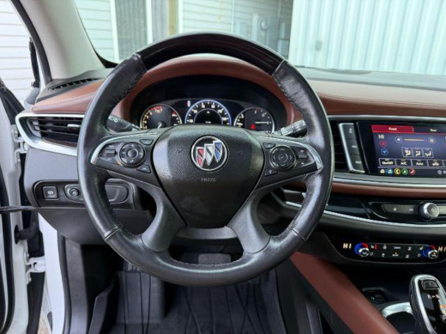 2021 White Frost Tricoat /Chestnut Seats w/Ebony Interior Accents, leather Buick Enclave Avenir AWD (5GAEVCKW7MJ) with an 3.6L V6 DOHC 24V engine, 9-Speed Automatic transmission, located at 1235 N Woodruff Ave., Idaho Falls, 83401, (208) 523-1053, 43.507172, -112.000488 - At Timberline Auto, finding a great deal on your next vehicle is always easy! Our experienced sales staff's goal is to help find you the right vehicle at the right price! Our knowledgeable finance department has options for almost any credit score. We offer extended service contract options to prote - Photo#49