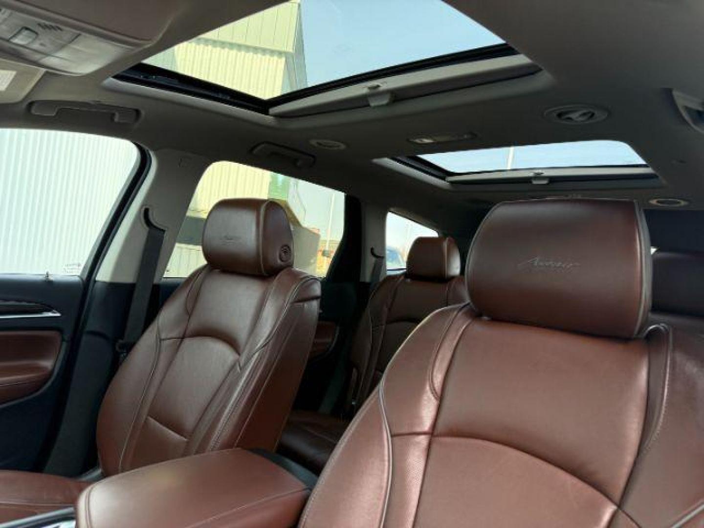 2021 White Frost Tricoat /Chestnut Seats w/Ebony Interior Accents, leather Buick Enclave Avenir AWD (5GAEVCKW7MJ) with an 3.6L V6 DOHC 24V engine, 9-Speed Automatic transmission, located at 1235 N Woodruff Ave., Idaho Falls, 83401, (208) 523-1053, 43.507172, -112.000488 - At Timberline Auto, finding a great deal on your next vehicle is always easy! Our experienced sales staff's goal is to help find you the right vehicle at the right price! Our knowledgeable finance department has options for almost any credit score. We offer extended service contract options to prote - Photo#54