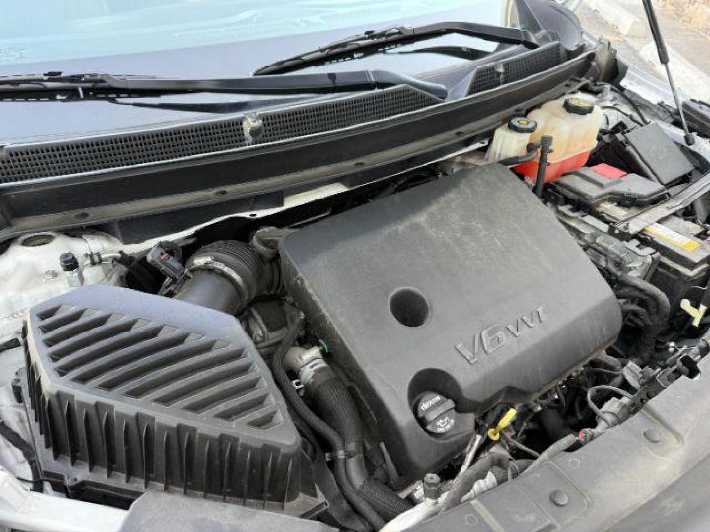 2021 White Frost Tricoat /Chestnut Seats w/Ebony Interior Accents, leather Buick Enclave Avenir AWD (5GAEVCKW7MJ) with an 3.6L V6 DOHC 24V engine, 9-Speed Automatic transmission, located at 1235 N Woodruff Ave., Idaho Falls, 83401, (208) 523-1053, 43.507172, -112.000488 - At Timberline Auto, finding a great deal on your next vehicle is always easy! Our experienced sales staff's goal is to help find you the right vehicle at the right price! Our knowledgeable finance department has options for almost any credit score. We offer extended service contract options to prote - Photo#59