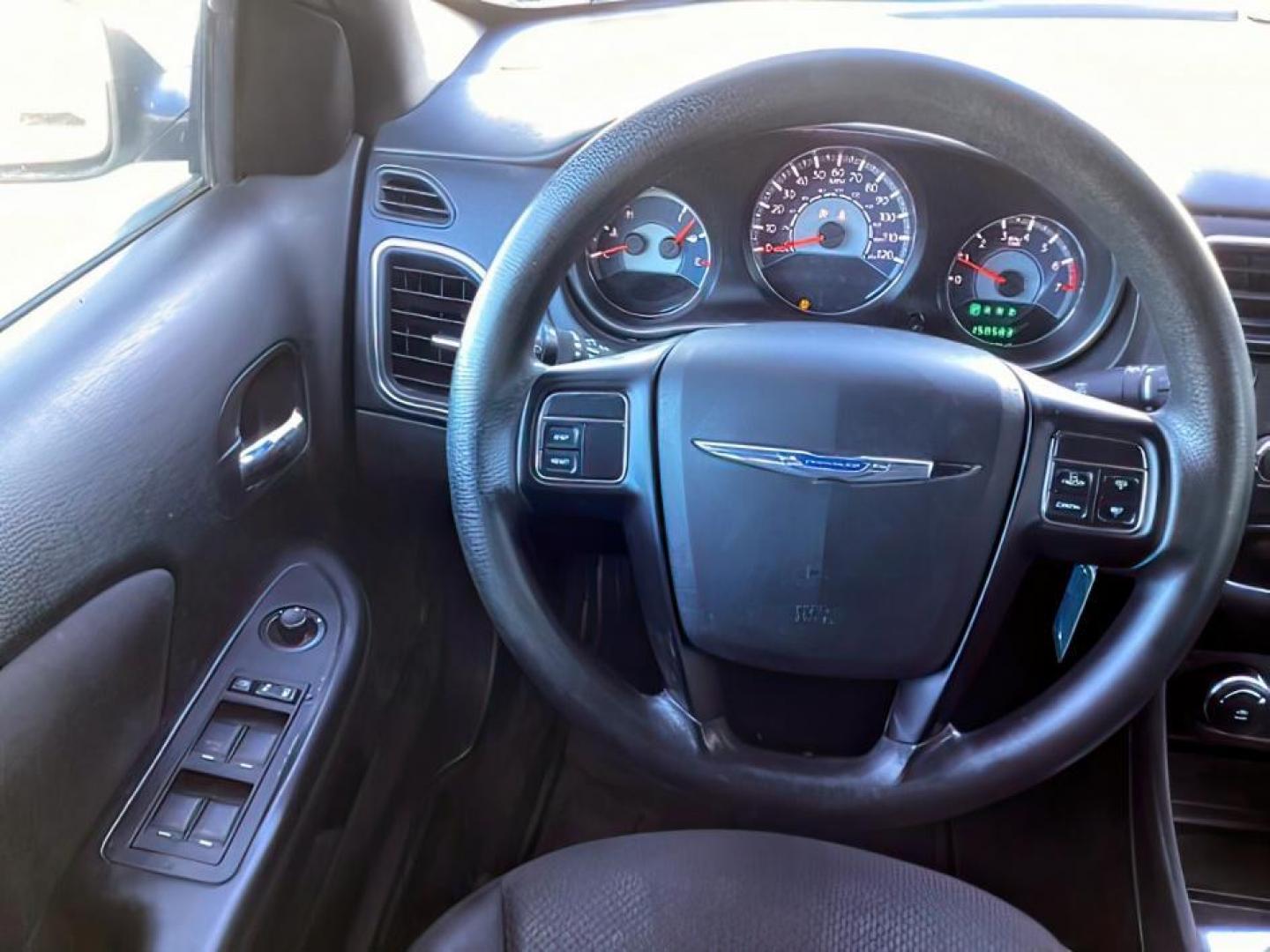2013 Billet Silver Metallic /Black Cloth Interior Chrysler 200 LX (1C3CCBAB8DN) with an 2.4L L4 DOHC 16V engine, 6-Speed Automatic transmission, located at 1235 N Woodruff Ave., Idaho Falls, 83401, (208) 523-1053, 43.507172, -112.000488 - At Timberline Auto, finding a great deal on your next vehicle is always easy! Our experienced sales staff's goal is to help find you the right vehicle at the right price! Our knowledgeable finance department has options for almost any credit score. We offer extended service contract options to prote - Photo#11