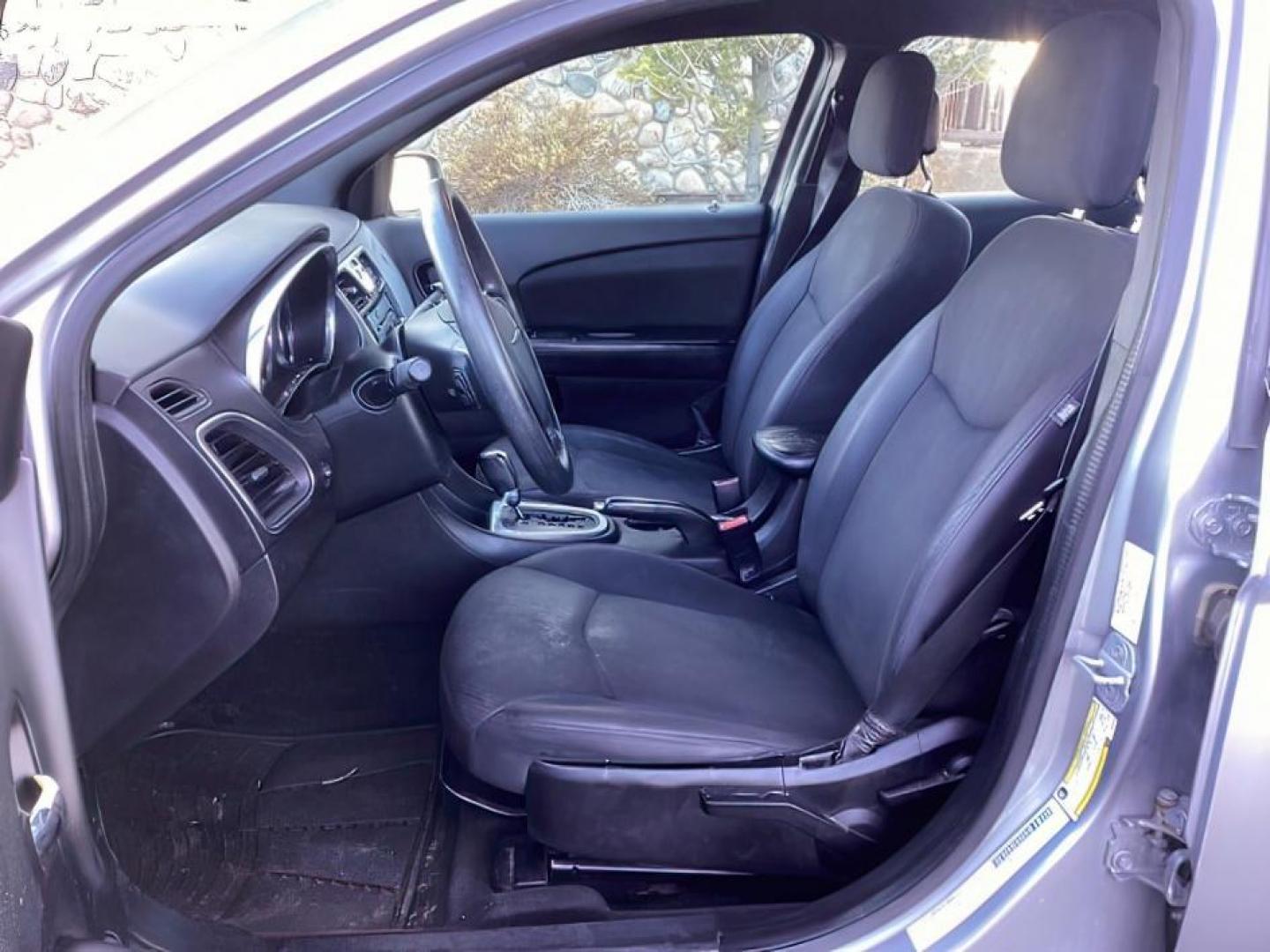 2013 Billet Silver Metallic /Black Cloth Interior Chrysler 200 LX (1C3CCBAB8DN) with an 2.4L L4 DOHC 16V engine, 6-Speed Automatic transmission, located at 1235 N Woodruff Ave., Idaho Falls, 83401, (208) 523-1053, 43.507172, -112.000488 - At Timberline Auto, finding a great deal on your next vehicle is always easy! Our experienced sales staff's goal is to help find you the right vehicle at the right price! Our knowledgeable finance department has options for almost any credit score. We offer extended service contract options to prote - Photo#15