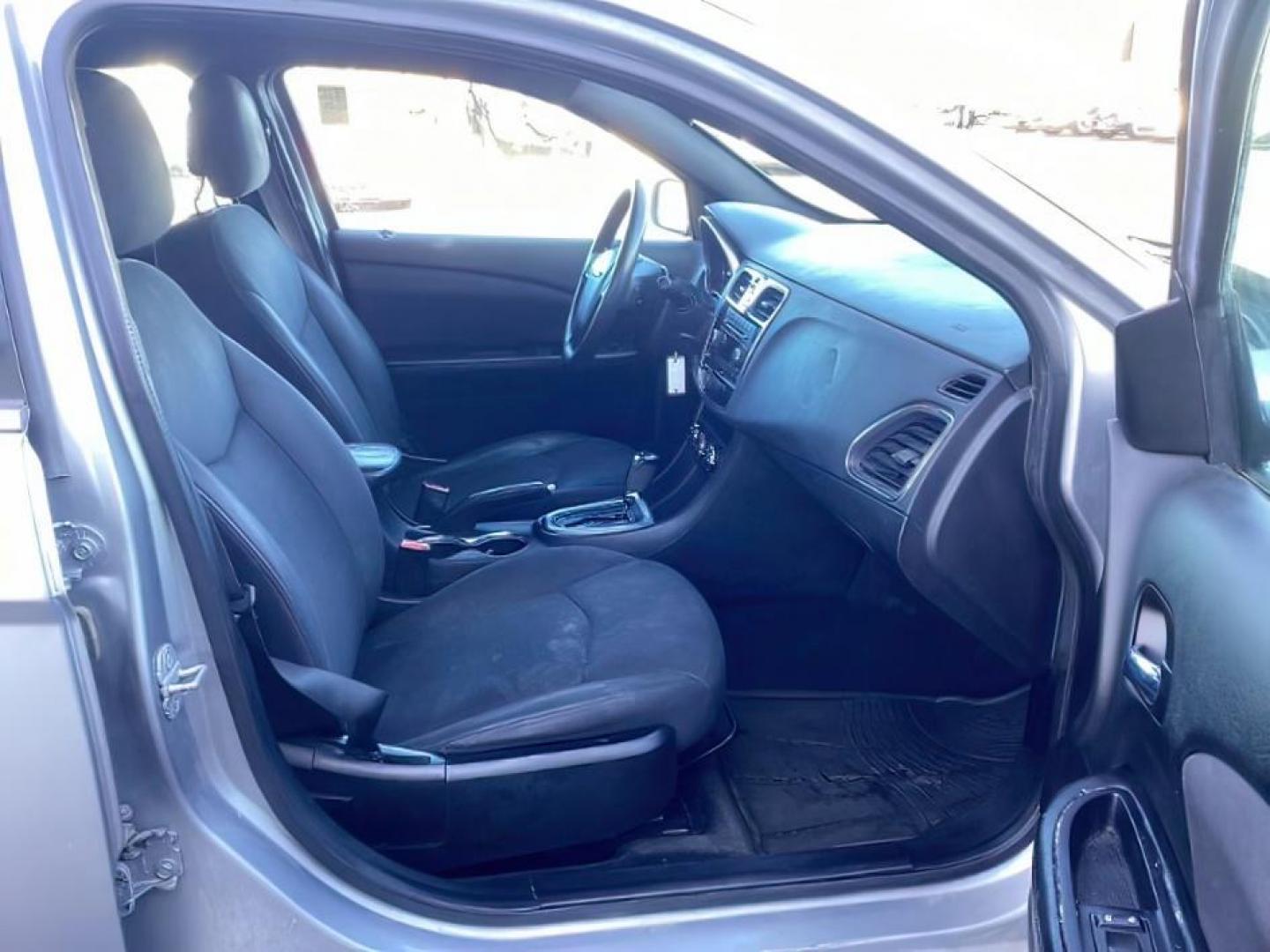 2013 Billet Silver Metallic /Black Cloth Interior Chrysler 200 LX (1C3CCBAB8DN) with an 2.4L L4 DOHC 16V engine, 6-Speed Automatic transmission, located at 1235 N Woodruff Ave., Idaho Falls, 83401, (208) 523-1053, 43.507172, -112.000488 - At Timberline Auto, finding a great deal on your next vehicle is always easy! Our experienced sales staff's goal is to help find you the right vehicle at the right price! Our knowledgeable finance department has options for almost any credit score. We offer extended service contract options to prote - Photo#17