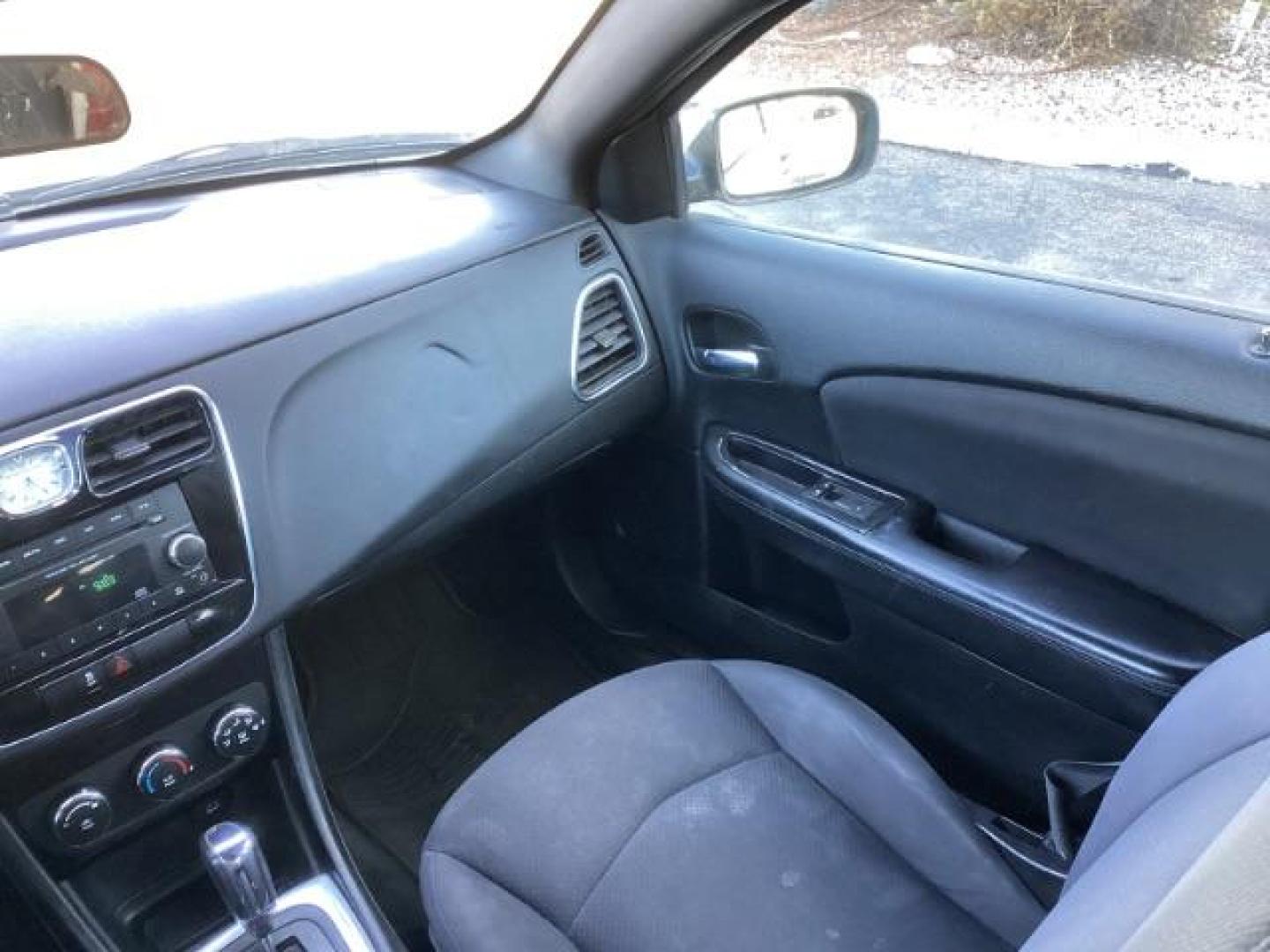 2013 Billet Silver Metallic /Black Cloth Interior Chrysler 200 LX (1C3CCBAB8DN) with an 2.4L L4 DOHC 16V engine, 6-Speed Automatic transmission, located at 1235 N Woodruff Ave., Idaho Falls, 83401, (208) 523-1053, 43.507172, -112.000488 - At Timberline Auto, finding a great deal on your next vehicle is always easy! Our experienced sales staff's goal is to help find you the right vehicle at the right price! Our knowledgeable finance department has options for almost any credit score. We offer extended service contract options to prote - Photo#14