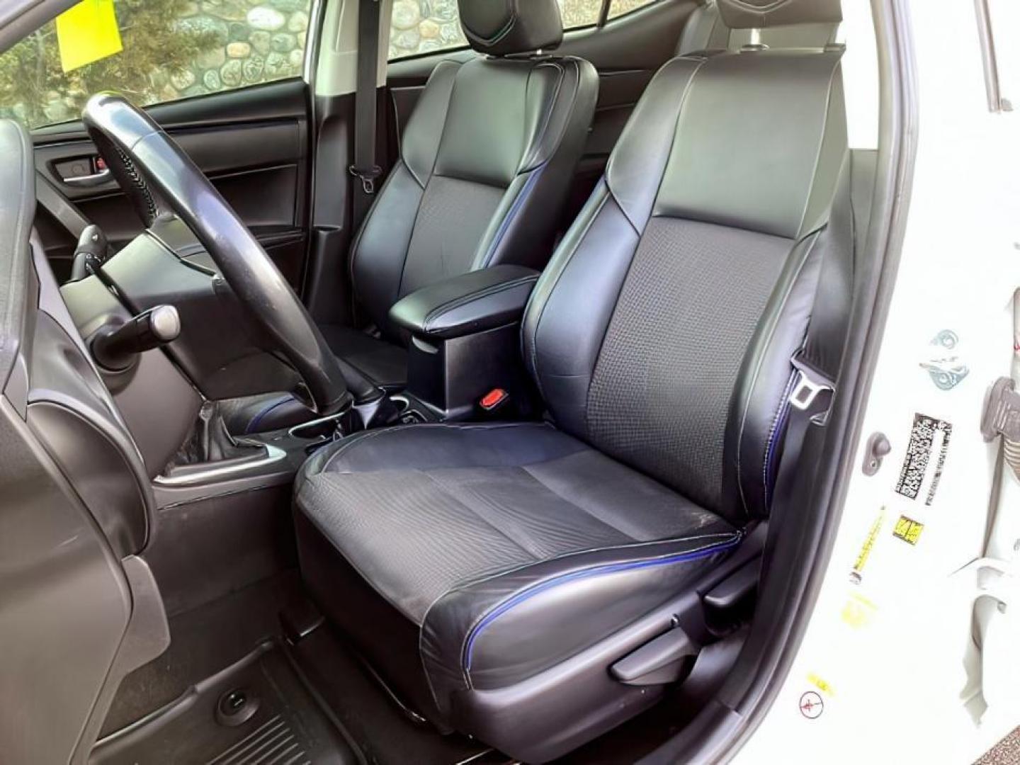 2019 Super White /Black Mixed Media, leatherette/cloth Toyota Corolla SE 6M (2T1BURHE4KC) with an 1.8L L4 DOHC 16V engine, 6-Speed Manual transmission, located at 1235 N Woodruff Ave., Idaho Falls, 83401, (208) 523-1053, 43.507172, -112.000488 - At Timberline Auto, finding a great deal on your next vehicle is always easy! Our experienced sales staff's goal is to help find you the right vehicle at the right price! Our knowledgeable finance department has options for almost any credit score. We offer extended service contract options to prote - Photo#10