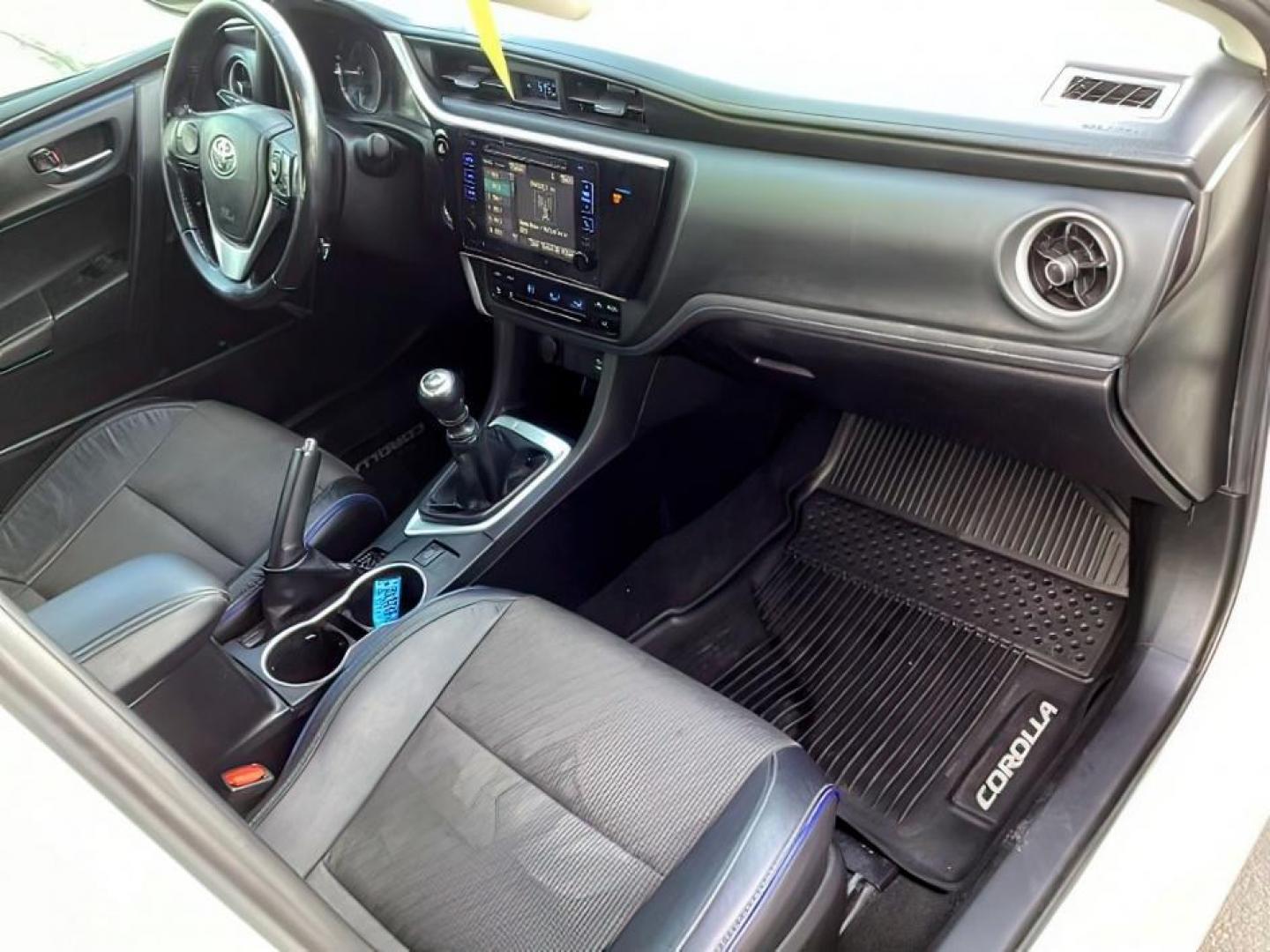 2019 Super White /Black Mixed Media, leatherette/cloth Toyota Corolla SE 6M (2T1BURHE4KC) with an 1.8L L4 DOHC 16V engine, 6-Speed Manual transmission, located at 1235 N Woodruff Ave., Idaho Falls, 83401, (208) 523-1053, 43.507172, -112.000488 - At Timberline Auto, finding a great deal on your next vehicle is always easy! Our experienced sales staff's goal is to help find you the right vehicle at the right price! Our knowledgeable finance department has options for almost any credit score. We offer extended service contract options to prote - Photo#13