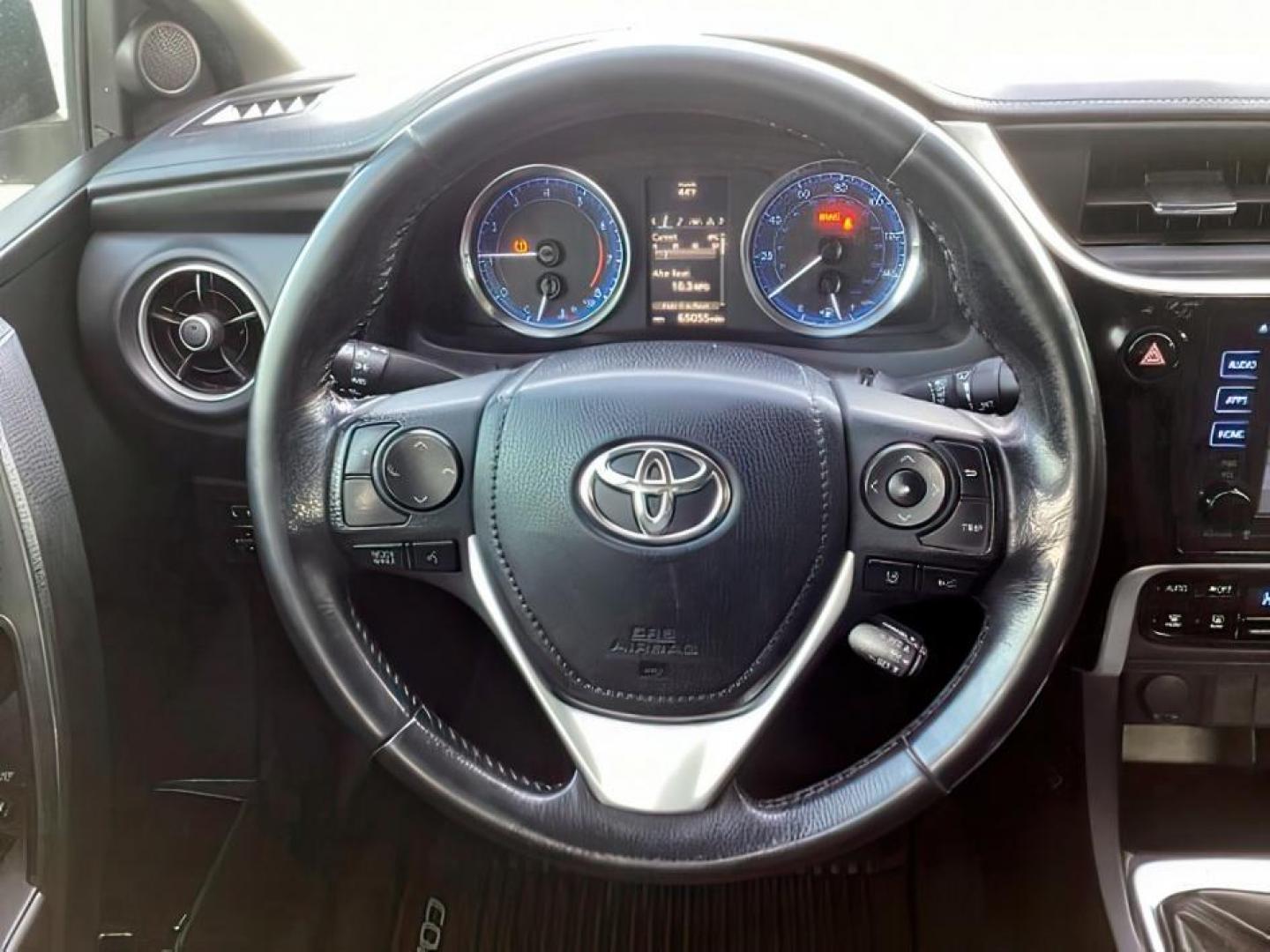 2019 Super White /Black Mixed Media, leatherette/cloth Toyota Corolla SE 6M (2T1BURHE4KC) with an 1.8L L4 DOHC 16V engine, 6-Speed Manual transmission, located at 1235 N Woodruff Ave., Idaho Falls, 83401, (208) 523-1053, 43.507172, -112.000488 - At Timberline Auto, finding a great deal on your next vehicle is always easy! Our experienced sales staff's goal is to help find you the right vehicle at the right price! Our knowledgeable finance department has options for almost any credit score. We offer extended service contract options to prote - Photo#19