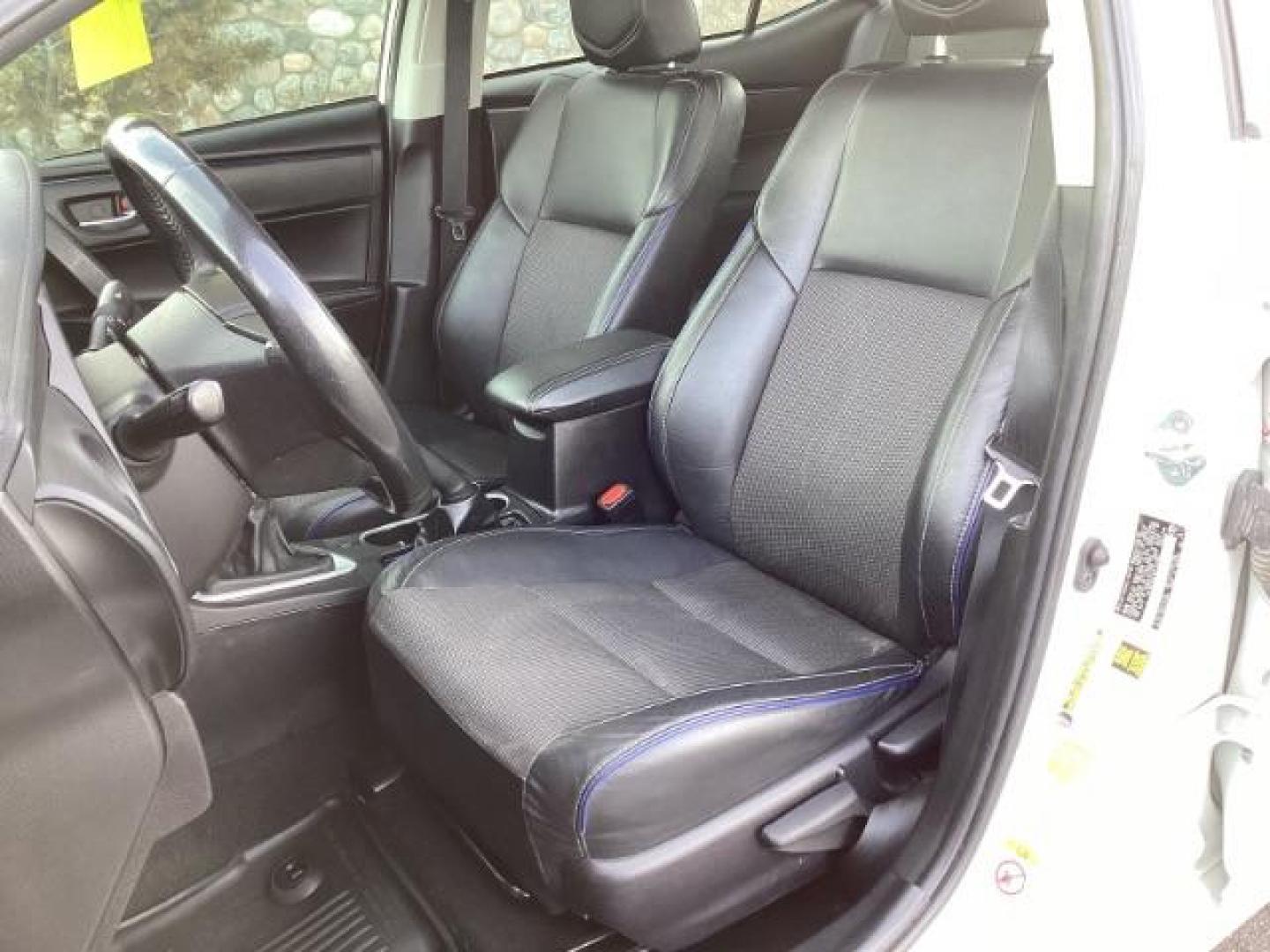 2019 Super White /Black Mixed Media, leatherette/cloth Toyota Corolla SE 6M (2T1BURHE4KC) with an 1.8L L4 DOHC 16V engine, 6-Speed Manual transmission, located at 1235 N Woodruff Ave., Idaho Falls, 83401, (208) 523-1053, 43.507172, -112.000488 - At Timberline Auto, finding a great deal on your next vehicle is always easy! Our experienced sales staff's goal is to help find you the right vehicle at the right price! Our knowledgeable finance department has options for almost any credit score. We offer extended service contract options to prote - Photo#11