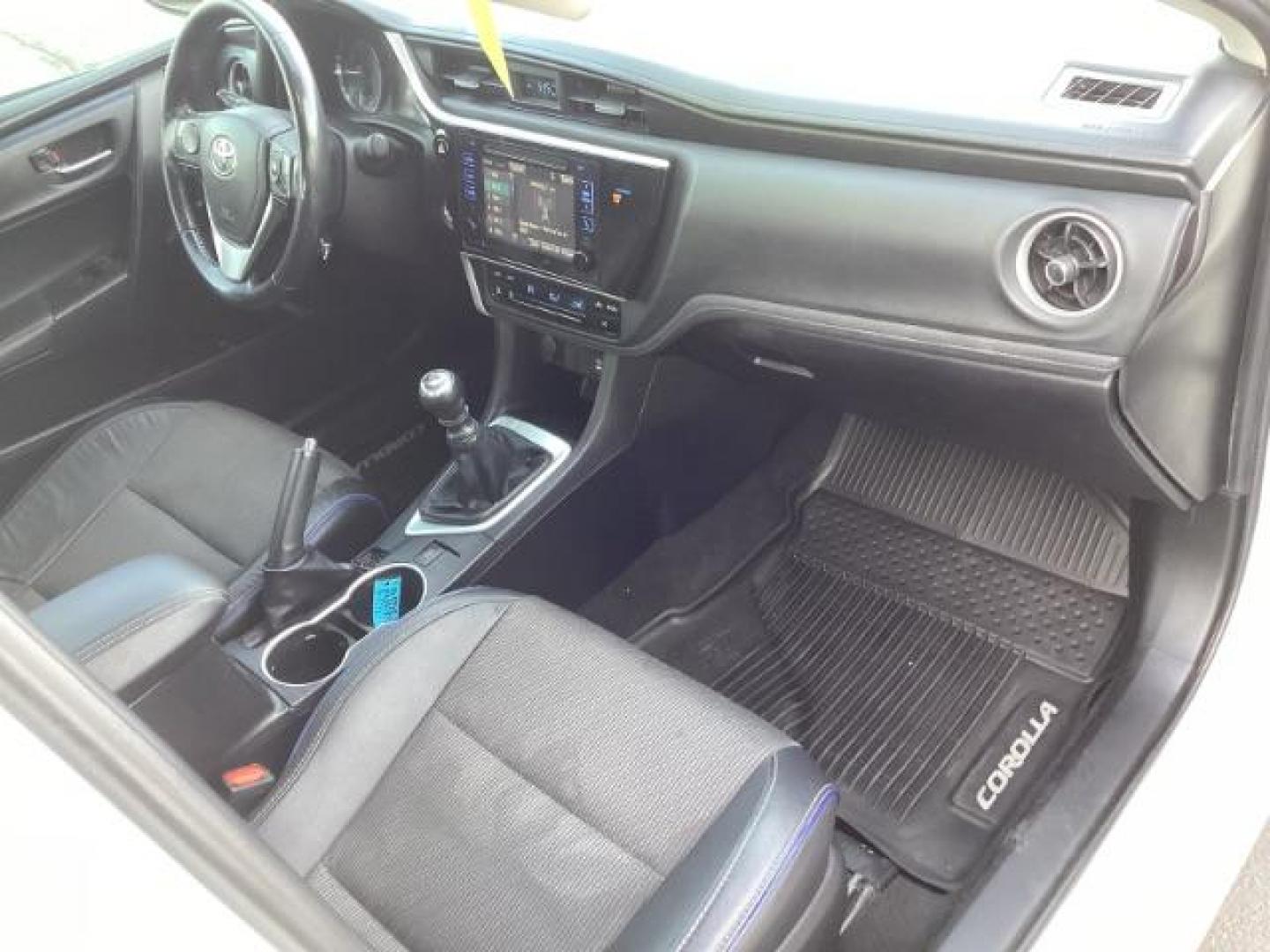 2019 Super White /Black Mixed Media, leatherette/cloth Toyota Corolla SE 6M (2T1BURHE4KC) with an 1.8L L4 DOHC 16V engine, 6-Speed Manual transmission, located at 1235 N Woodruff Ave., Idaho Falls, 83401, (208) 523-1053, 43.507172, -112.000488 - At Timberline Auto, finding a great deal on your next vehicle is always easy! Our experienced sales staff's goal is to help find you the right vehicle at the right price! Our knowledgeable finance department has options for almost any credit score. We offer extended service contract options to prote - Photo#14
