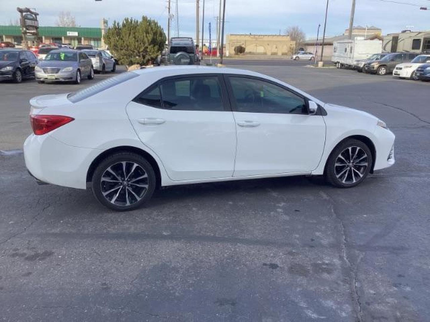 2019 Super White /Black Mixed Media, leatherette/cloth Toyota Corolla SE 6M (2T1BURHE4KC) with an 1.8L L4 DOHC 16V engine, 6-Speed Manual transmission, located at 1235 N Woodruff Ave., Idaho Falls, 83401, (208) 523-1053, 43.507172, -112.000488 - At Timberline Auto, finding a great deal on your next vehicle is always easy! Our experienced sales staff's goal is to help find you the right vehicle at the right price! Our knowledgeable finance department has options for almost any credit score. We offer extended service contract options to prote - Photo#6