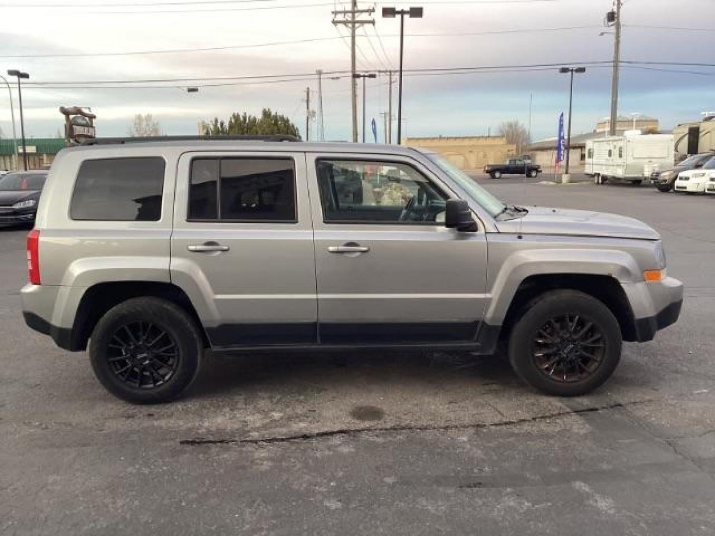 2015 Billet Silver Metallic CC /Dark Slate Gray Jeep Patriot Sport 4WD (1C4NJRAB6FD) with an 2.4L L4 DOHC 16V engine, Continuously Variable Transmission transmission, located at 1235 N Woodruff Ave., Idaho Falls, 83401, (208) 523-1053, 43.507172, -112.000488 - Photo#6