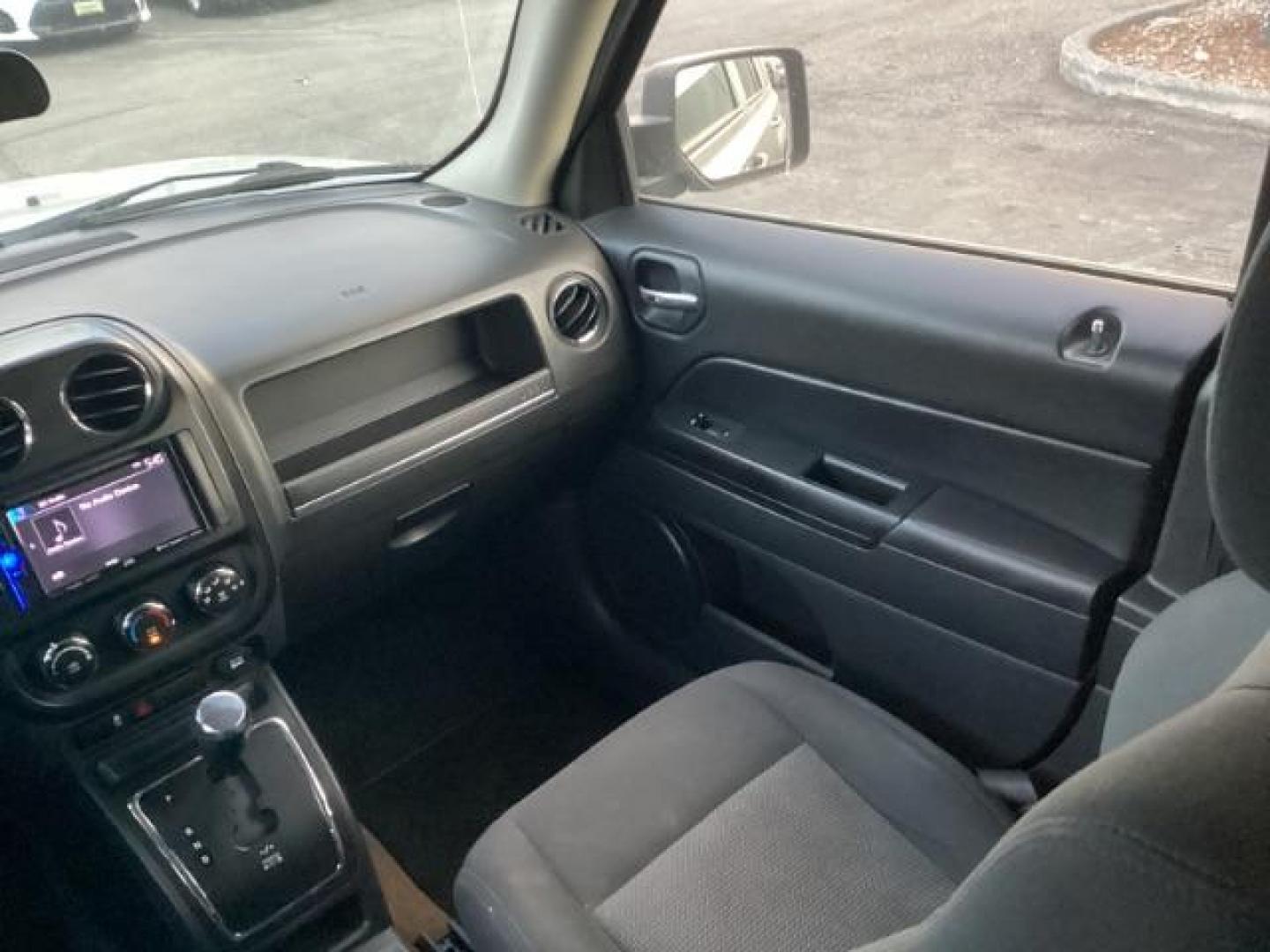 2015 Billet Silver Metallic CC /Dark Slate Gray Jeep Patriot Sport 4WD (1C4NJRAB6FD) with an 2.4L L4 DOHC 16V engine, Continuously Variable Transmission transmission, located at 1235 N Woodruff Ave., Idaho Falls, 83401, (208) 523-1053, 43.507172, -112.000488 - Photo#14