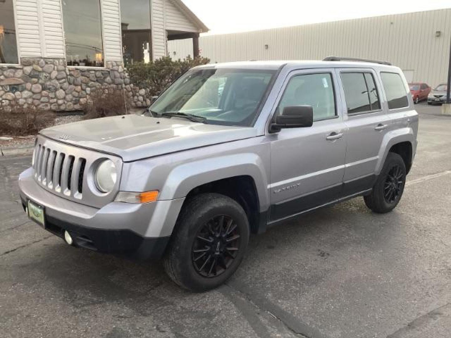 2015 Billet Silver Metallic CC /Dark Slate Gray Jeep Patriot Sport 4WD (1C4NJRAB6FD) with an 2.4L L4 DOHC 16V engine, Continuously Variable Transmission transmission, located at 1235 N Woodruff Ave., Idaho Falls, 83401, (208) 523-1053, 43.507172, -112.000488 - Photo#1