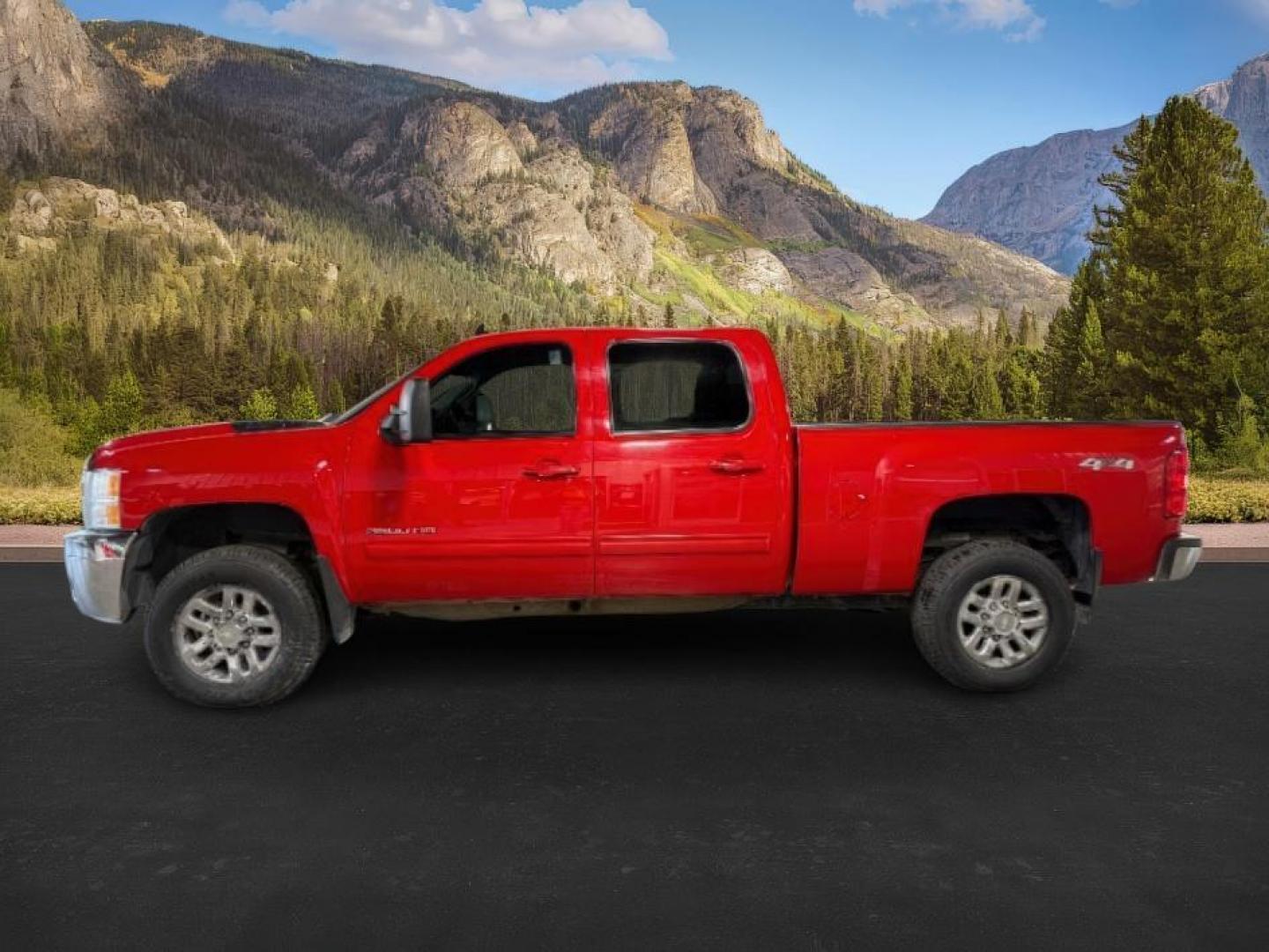 2013 Victory Red /Ebony Leather Interior Chevrolet Silverado 3500HD LTZ Crew Cab 4WD (1GC4K1E80DF) with an 6.6L V8 OHV 32V TURBO DIESEL engine, 6-Speed Automatic transmission, located at 1235 N Woodruff Ave., Idaho Falls, 83401, (208) 523-1053, 43.507172, -112.000488 - At Timberline Auto, finding a great deal on your next vehicle is always easy! Our experienced sales staff's goal is to help find you the right vehicle at the right price! Our knowledgeable finance department has options for almost any credit score. We offer extended service contract options to prote - Photo#1