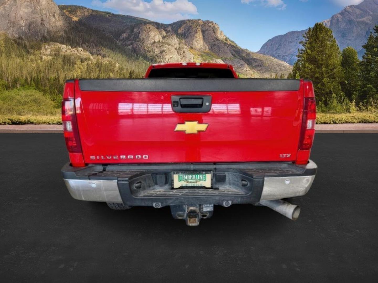 2013 Victory Red /Ebony Leather Interior Chevrolet Silverado 3500HD LTZ Crew Cab 4WD (1GC4K1E80DF) with an 6.6L V8 OHV 32V TURBO DIESEL engine, 6-Speed Automatic transmission, located at 1235 N Woodruff Ave., Idaho Falls, 83401, (208) 523-1053, 43.507172, -112.000488 - At Timberline Auto, finding a great deal on your next vehicle is always easy! Our experienced sales staff's goal is to help find you the right vehicle at the right price! Our knowledgeable finance department has options for almost any credit score. We offer extended service contract options to prote - Photo#3
