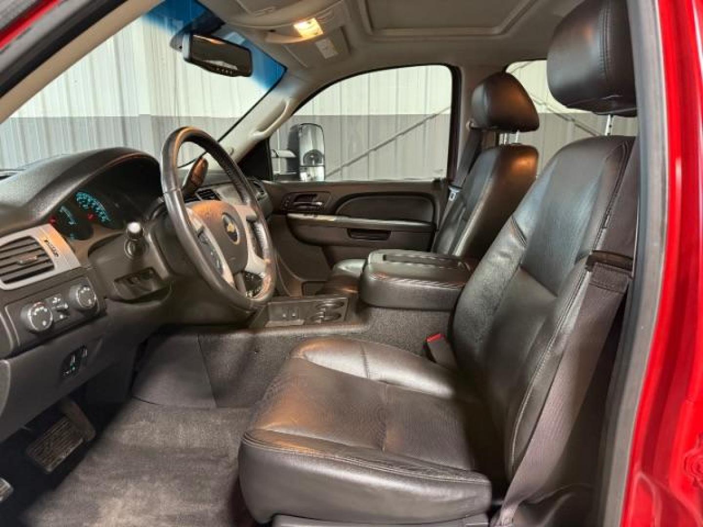2013 Victory Red /Ebony Leather Interior Chevrolet Silverado 3500HD LTZ Crew Cab 4WD (1GC4K1E80DF) with an 6.6L V8 OHV 32V TURBO DIESEL engine, 6-Speed Automatic transmission, located at 1235 N Woodruff Ave., Idaho Falls, 83401, (208) 523-1053, 43.507172, -112.000488 - At Timberline Auto, finding a great deal on your next vehicle is always easy! Our experienced sales staff's goal is to help find you the right vehicle at the right price! Our knowledgeable finance department has options for almost any credit score. We offer extended service contract options to prote - Photo#11