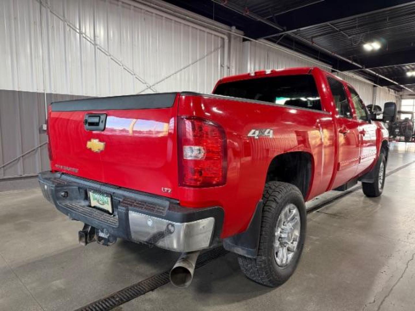 2013 Victory Red /Ebony Leather Interior Chevrolet Silverado 3500HD LTZ Crew Cab 4WD (1GC4K1E80DF) with an 6.6L V8 OHV 32V TURBO DIESEL engine, 6-Speed Automatic transmission, located at 1235 N Woodruff Ave., Idaho Falls, 83401, (208) 523-1053, 43.507172, -112.000488 - At Timberline Auto, finding a great deal on your next vehicle is always easy! Our experienced sales staff's goal is to help find you the right vehicle at the right price! Our knowledgeable finance department has options for almost any credit score. We offer extended service contract options to prote - Photo#5