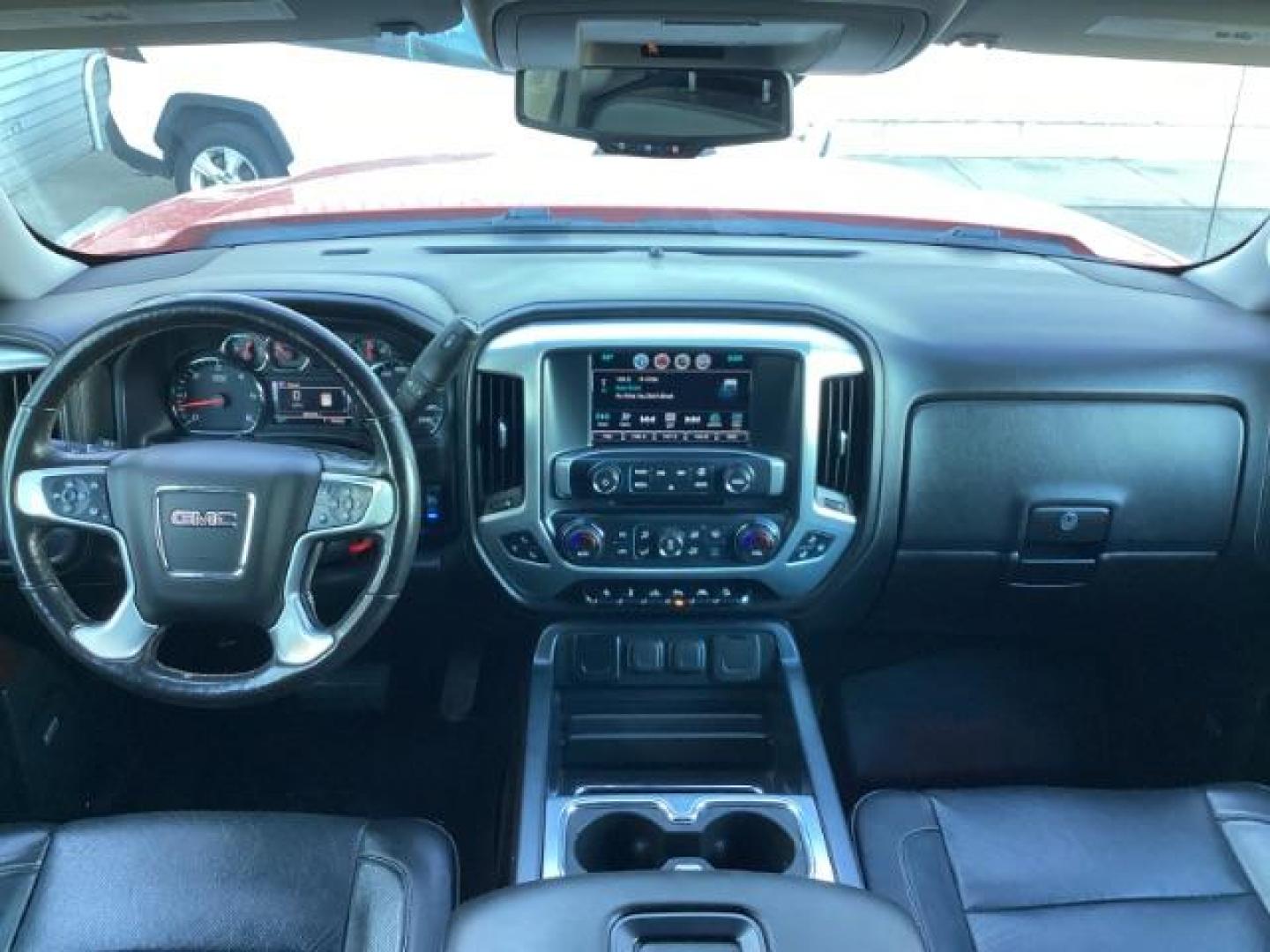 2017 Cardinal Red /Jet Black, leather GMC Sierra 1500 SLT Crew Cab Short Box 4WD (3GTU2NEC1HG) with an 5.3L V8 OHV 16V engine, 6-Speed Automatic transmission, located at 1235 N Woodruff Ave., Idaho Falls, 83401, (208) 523-1053, 43.507172, -112.000488 - At Timberline Auto, finding a great deal on your next vehicle is always easy! Our experienced sales staff's goal is to help find you the right vehicle at the right price! Our knowledgeable finance department has options for almost any credit score. We offer extended service contract options to prote - Photo#11