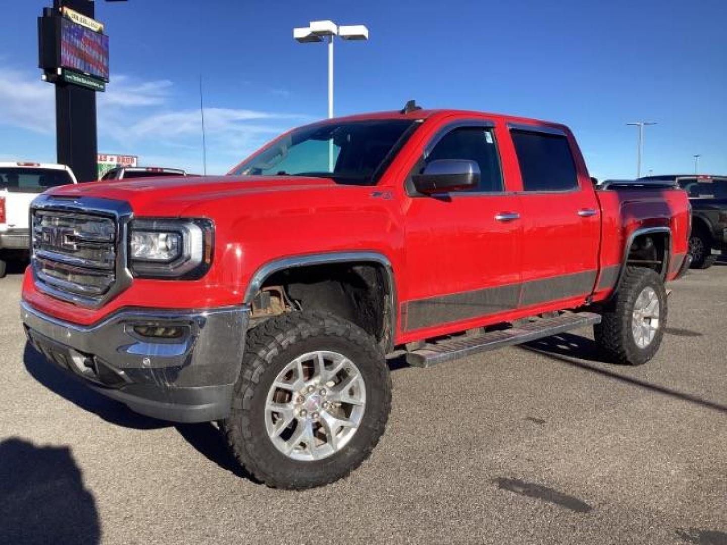2017 Cardinal Red /Jet Black, leather GMC Sierra 1500 SLT Crew Cab Short Box 4WD (3GTU2NEC1HG) with an 5.3L V8 OHV 16V engine, 6-Speed Automatic transmission, located at 1235 N Woodruff Ave., Idaho Falls, 83401, (208) 523-1053, 43.507172, -112.000488 - At Timberline Auto, finding a great deal on your next vehicle is always easy! Our experienced sales staff's goal is to help find you the right vehicle at the right price! Our knowledgeable finance department has options for almost any credit score. We offer extended service contract options to prote - Photo#1