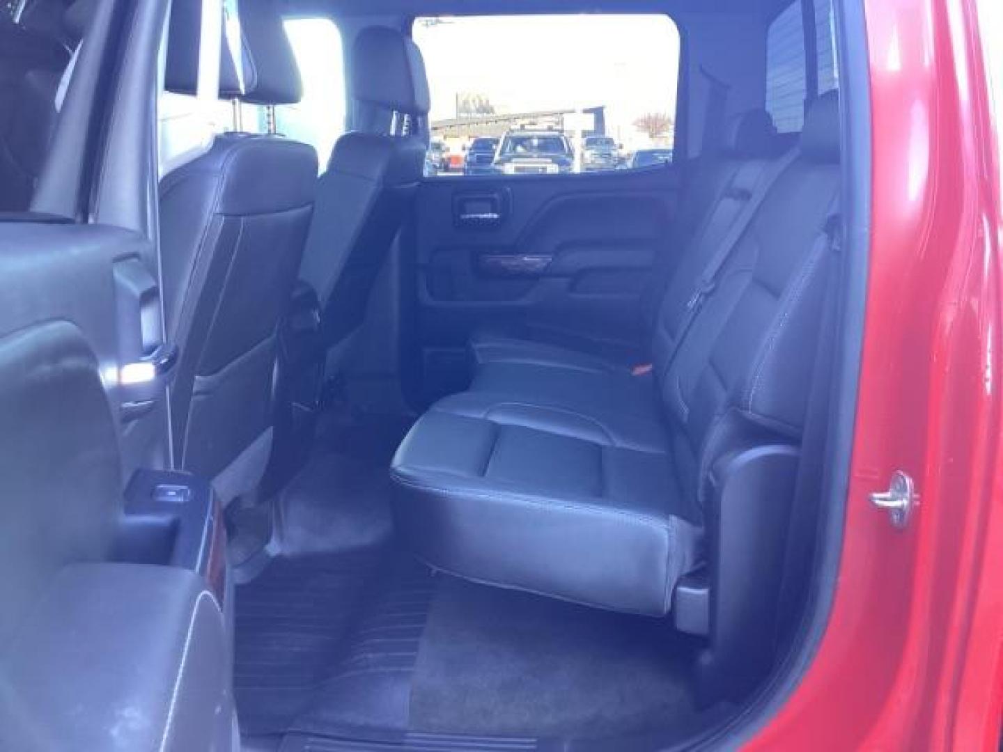 2017 Cardinal Red /Jet Black, leather GMC Sierra 1500 SLT Crew Cab Short Box 4WD (3GTU2NEC1HG) with an 5.3L V8 OHV 16V engine, 6-Speed Automatic transmission, located at 1235 N Woodruff Ave., Idaho Falls, 83401, (208) 523-1053, 43.507172, -112.000488 - At Timberline Auto, finding a great deal on your next vehicle is always easy! Our experienced sales staff's goal is to help find you the right vehicle at the right price! Our knowledgeable finance department has options for almost any credit score. We offer extended service contract options to prote - Photo#19