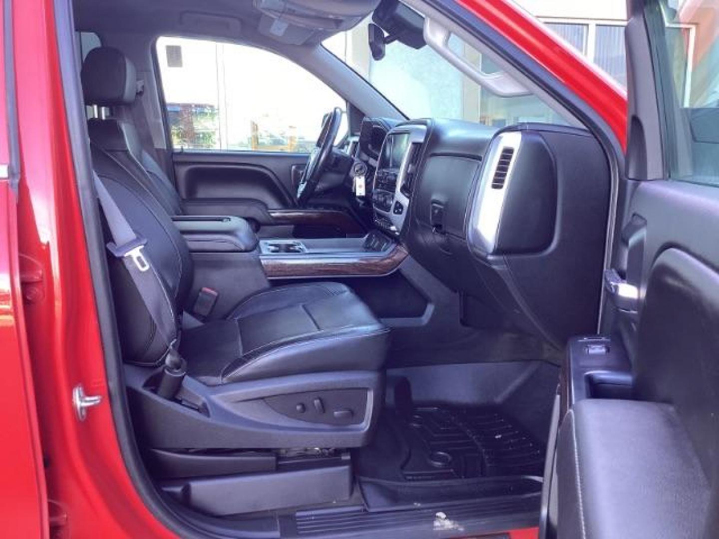 2017 Cardinal Red /Jet Black, leather GMC Sierra 1500 SLT Crew Cab Short Box 4WD (3GTU2NEC1HG) with an 5.3L V8 OHV 16V engine, 6-Speed Automatic transmission, located at 1235 N Woodruff Ave., Idaho Falls, 83401, (208) 523-1053, 43.507172, -112.000488 - At Timberline Auto, finding a great deal on your next vehicle is always easy! Our experienced sales staff's goal is to help find you the right vehicle at the right price! Our knowledgeable finance department has options for almost any credit score. We offer extended service contract options to prote - Photo#20