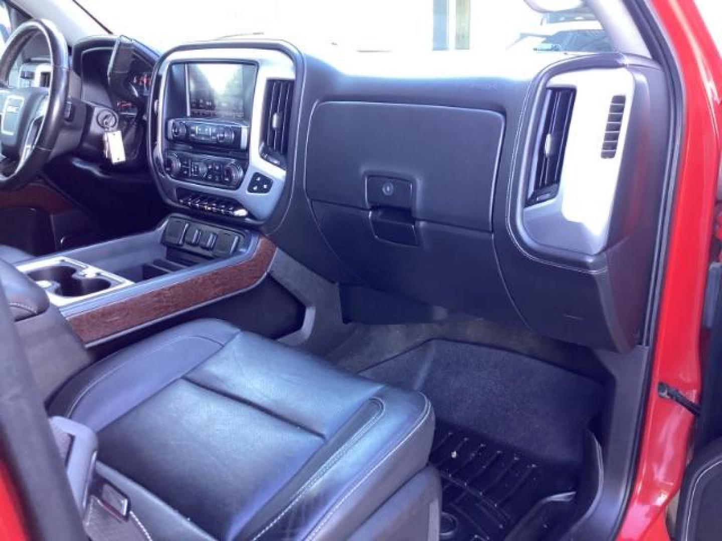2017 Cardinal Red /Jet Black, leather GMC Sierra 1500 SLT Crew Cab Short Box 4WD (3GTU2NEC1HG) with an 5.3L V8 OHV 16V engine, 6-Speed Automatic transmission, located at 1235 N Woodruff Ave., Idaho Falls, 83401, (208) 523-1053, 43.507172, -112.000488 - At Timberline Auto, finding a great deal on your next vehicle is always easy! Our experienced sales staff's goal is to help find you the right vehicle at the right price! Our knowledgeable finance department has options for almost any credit score. We offer extended service contract options to prote - Photo#21