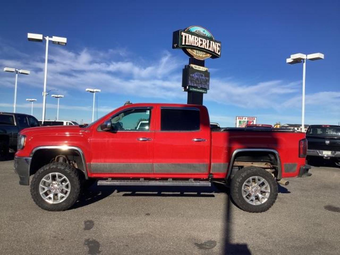 2017 Cardinal Red /Jet Black, leather GMC Sierra 1500 SLT Crew Cab Short Box 4WD (3GTU2NEC1HG) with an 5.3L V8 OHV 16V engine, 6-Speed Automatic transmission, located at 1235 N Woodruff Ave., Idaho Falls, 83401, (208) 523-1053, 43.507172, -112.000488 - At Timberline Auto, finding a great deal on your next vehicle is always easy! Our experienced sales staff's goal is to help find you the right vehicle at the right price! Our knowledgeable finance department has options for almost any credit score. We offer extended service contract options to prote - Photo#2