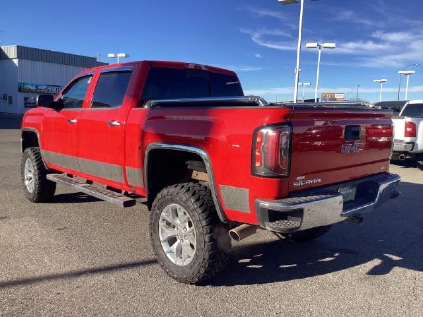 2017 Cardinal Red /Jet Black, leather GMC Sierra 1500 SLT Crew Cab Short Box 4WD (3GTU2NEC1HG) with an 5.3L V8 OHV 16V engine, 6-Speed Automatic transmission, located at 1235 N Woodruff Ave., Idaho Falls, 83401, (208) 523-1053, 43.507172, -112.000488 - At Timberline Auto, finding a great deal on your next vehicle is always easy! Our experienced sales staff's goal is to help find you the right vehicle at the right price! Our knowledgeable finance department has options for almost any credit score. We offer extended service contract options to prote - Photo#3