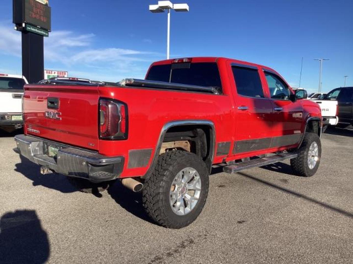 2017 Cardinal Red /Jet Black, leather GMC Sierra 1500 SLT Crew Cab Short Box 4WD (3GTU2NEC1HG) with an 5.3L V8 OHV 16V engine, 6-Speed Automatic transmission, located at 1235 N Woodruff Ave., Idaho Falls, 83401, (208) 523-1053, 43.507172, -112.000488 - At Timberline Auto, finding a great deal on your next vehicle is always easy! Our experienced sales staff's goal is to help find you the right vehicle at the right price! Our knowledgeable finance department has options for almost any credit score. We offer extended service contract options to prote - Photo#5