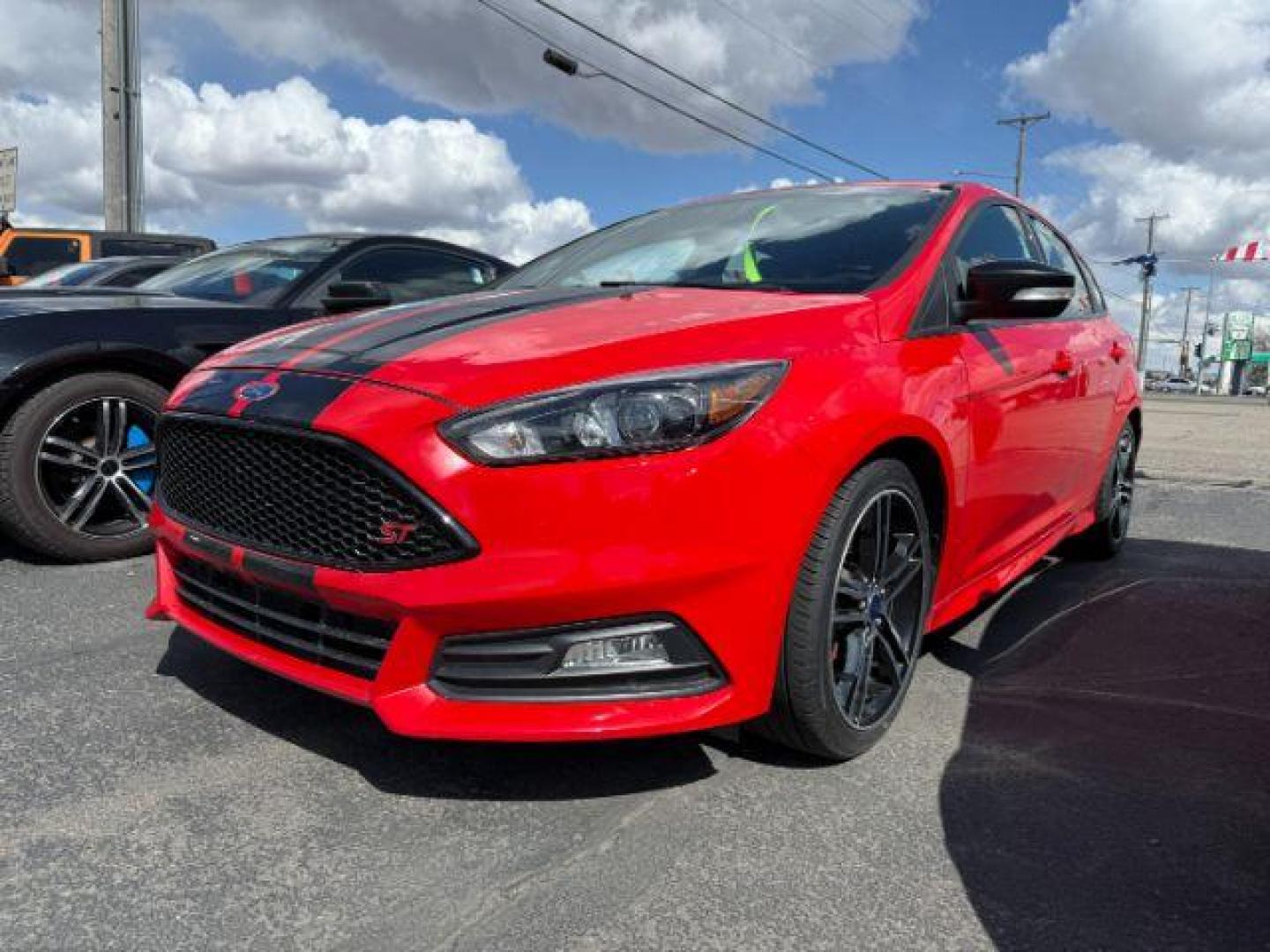 2015 Race Red /Charcoal Black, leather Ford Focus ST Hatch (1FADP3L93FL) with an 2.0L L4 DOHC 16V engine, 6-Speed Manua transmission, located at 1235 N Woodruff Ave., Idaho Falls, 83401, (208) 523-1053, 43.507172, -112.000488 - At Timberline Auto, finding a great deal on your next vehicle is always easy! Our experienced sales staff's goal is to help find you the right vehicle at the right price! Our knowledgeable finance department has options for almost any credit score. We offer extended service contract options to prote - Photo#1