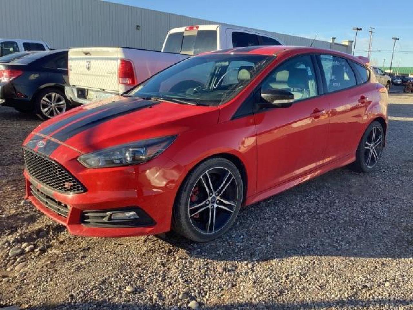 2015 Race Red /Charcoal Black, leather Ford Focus ST Hatch (1FADP3L93FL) with an 2.0L L4 DOHC 16V engine, 6-Speed Manua transmission, located at 1235 N Woodruff Ave., Idaho Falls, 83401, (208) 523-1053, 43.507172, -112.000488 - At Timberline Auto, finding a great deal on your next vehicle is always easy! Our experienced sales staff's goal is to help find you the right vehicle at the right price! Our knowledgeable finance department has options for almost any credit score. We offer extended service contract options to prote - Photo#0