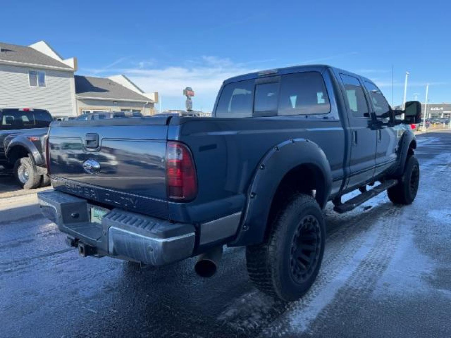 2015 BLUE /Black Ford F-350 SD Lariat Crew Cab 4WD (1FT8W3BT4FE) with an 6.7L V8 OHV 16V DIESEL engine, 6-Speed Automatic transmission, located at 1235 N Woodruff Ave., Idaho Falls, 83401, (208) 523-1053, 43.507172, -112.000488 - Photo#4
