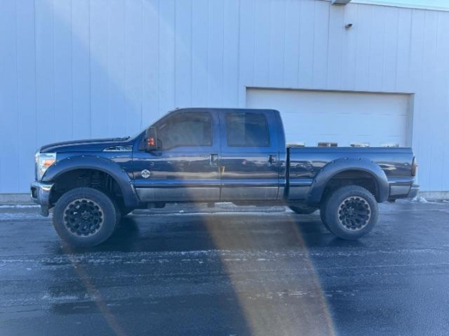 2015 BLUE /Black Ford F-350 SD Lariat Crew Cab 4WD (1FT8W3BT4FE) with an 6.7L V8 OHV 16V DIESEL engine, 6-Speed Automatic transmission, located at 1235 N Woodruff Ave., Idaho Falls, 83401, (208) 523-1053, 43.507172, -112.000488 - Photo#1