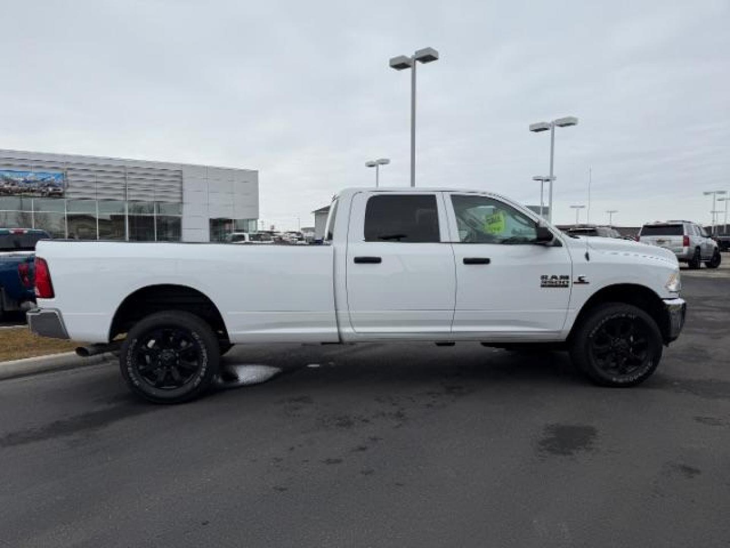 2018 WHITE /Black/Diesel Gray, cloth RAM 3500 Tradesman Crew Cab 4WD (3C63R3GL0JG) with an 6.7L L6 OHV 24V TURBO DIESEL engine, 6-Speed Automatic transmission, located at 1235 N Woodruff Ave., Idaho Falls, 83401, (208) 523-1053, 43.507172, -112.000488 - At Timberline Auto, finding a great deal on your next vehicle is always easy! Our experienced sales staff's goal is to help find you the right vehicle at the right price! Our knowledgeable finance department has options for almost any credit score. We offer extended service contract options to prote - Photo#5