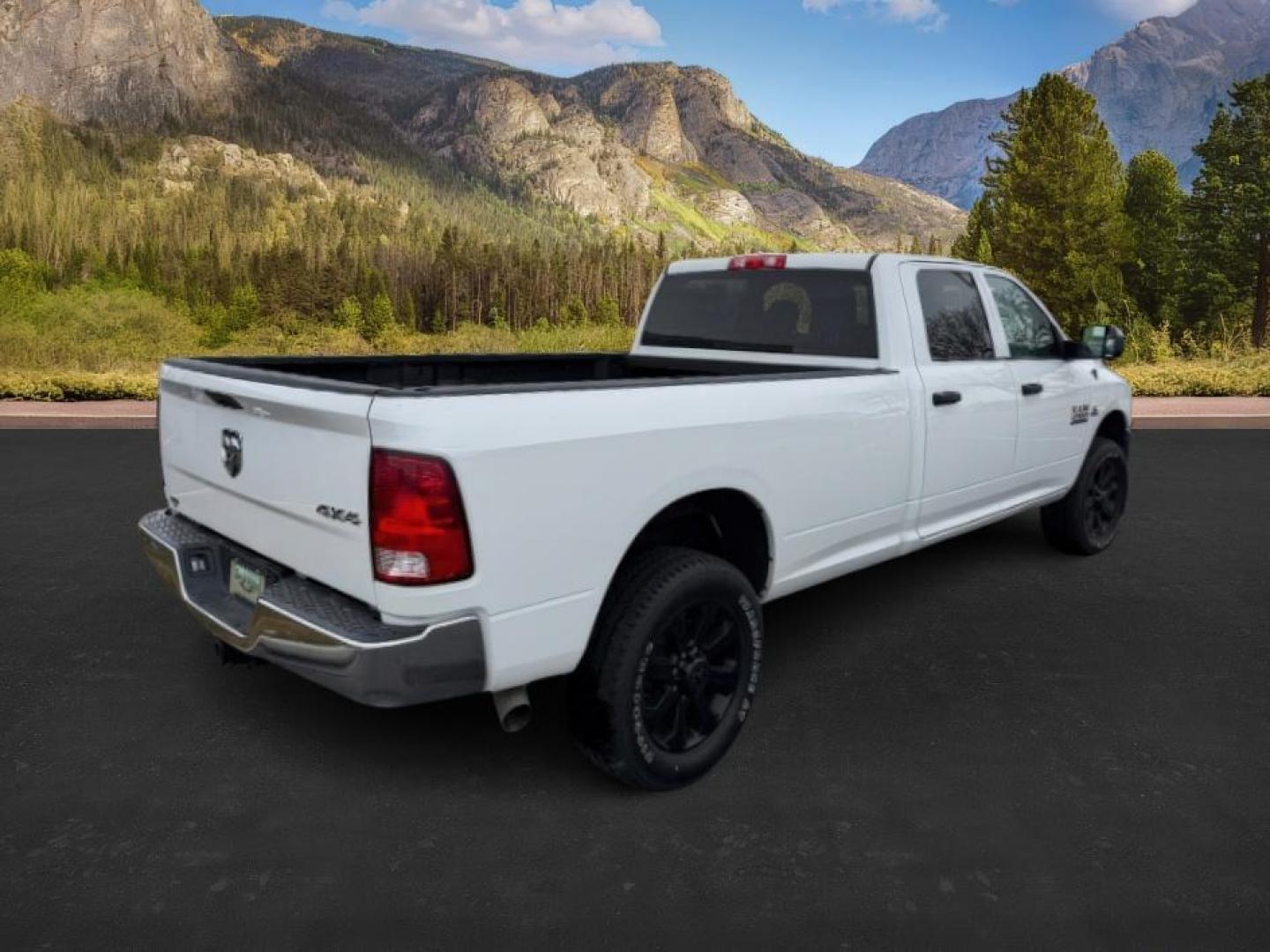 2018 WHITE /Black/Diesel Gray, cloth Ram 3500 (3C63R3GL0JG) with an 67L L6 OHV 24V TURBO DIESEL engine, Automatic transmission, located at 1175 N Woodruff Ave, Idaho Falls, ID, 83401, 43.506901, -111.999657 - At Timberline Auto, finding a great deal on your next vehicle is always easy! Our experienced sales staff's goal is to help find you the right vehicle at the right price! Our knowledgeable finance department has options for almost any credit score. We offer extended service contract options to prote - Photo#4