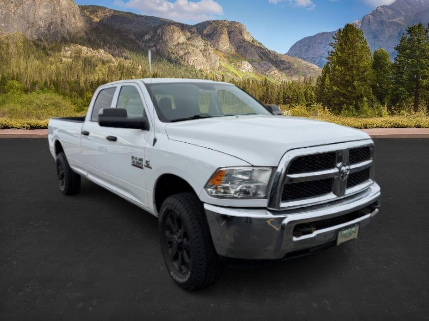 2018 WHITE /Black/Diesel Gray, cloth Ram 3500 (3C63R3GL0JG) with an 67L L6 OHV 24V TURBO DIESEL engine, Automatic transmission, located at 1175 N Woodruff Ave, Idaho Falls, ID, 83401, 43.506901, -111.999657 - At Timberline Auto, finding a great deal on your next vehicle is always easy! Our experienced sales staff's goal is to help find you the right vehicle at the right price! Our knowledgeable finance department has options for almost any credit score. We offer extended service contract options to prote - Photo#6