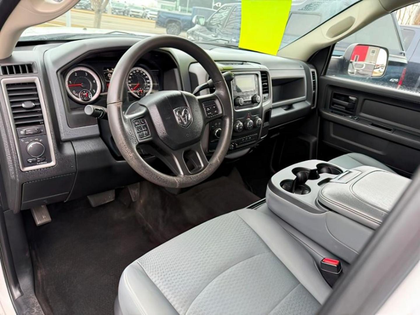 2018 WHITE /Black/Diesel Gray, cloth Ram 3500 (3C63R3GL0JG) with an 67L L6 OHV 24V TURBO DIESEL engine, Automatic transmission, located at 1175 N Woodruff Ave, Idaho Falls, ID, 83401, 43.506901, -111.999657 - At Timberline Auto, finding a great deal on your next vehicle is always easy! Our experienced sales staff's goal is to help find you the right vehicle at the right price! Our knowledgeable finance department has options for almost any credit score. We offer extended service contract options to prote - Photo#12