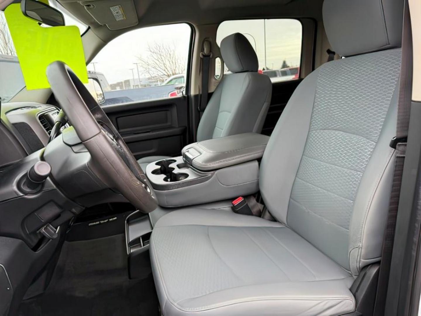 2018 WHITE /Black/Diesel Gray, cloth Ram 3500 (3C63R3GL0JG) with an 67L L6 OHV 24V TURBO DIESEL engine, Automatic transmission, located at 1175 N Woodruff Ave, Idaho Falls, ID, 83401, 43.506901, -111.999657 - At Timberline Auto, finding a great deal on your next vehicle is always easy! Our experienced sales staff's goal is to help find you the right vehicle at the right price! Our knowledgeable finance department has options for almost any credit score. We offer extended service contract options to prote - Photo#13