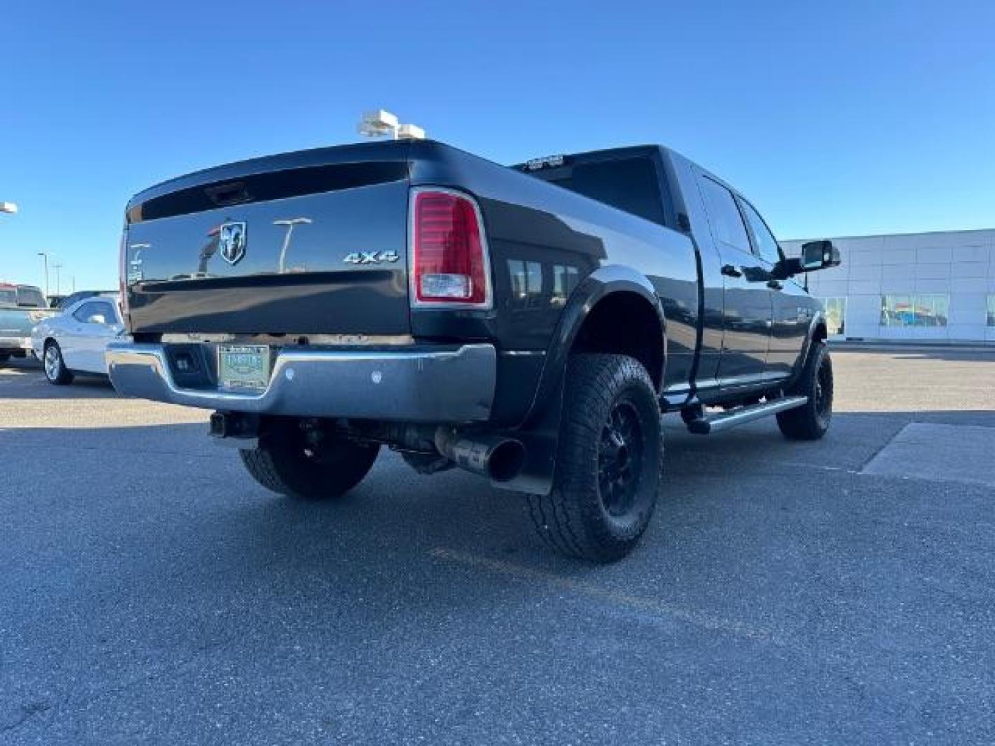2018 GRAY /Black, leather RAM 2500 Laramie Mega Cab 4WD (3C6UR5NL2JG) with an 6.7L L6 OHV 24V TURBO DIESEL engine, 6-Speed Automatic transmission, located at 1235 N Woodruff Ave., Idaho Falls, 83401, (208) 523-1053, 43.507172, -112.000488 - At Timberline Auto, finding a great deal on your next vehicle is always easy! Our experienced sales staff's goal is to help find you the right vehicle at the right price! Our knowledgeable finance department has options for almost any credit score. We offer extended service contract options to prote - Photo#5